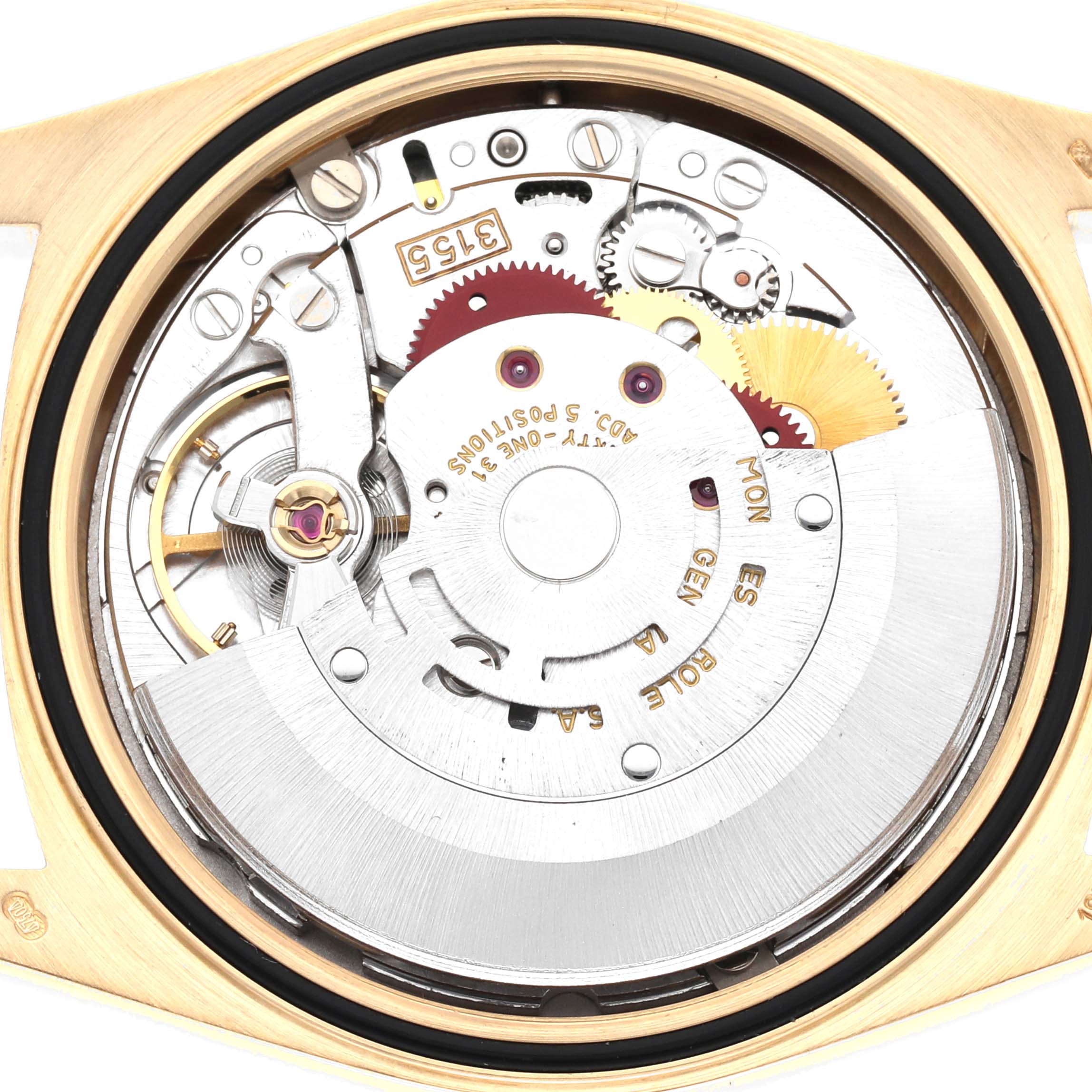 This image shows a close-up view of the internal mechanism of a Rolex President 18238 Men's Yellow Gold Grey Dial 18238 Men's Yellow Gold Grey Dial watch, highlighting its gears and movement components.