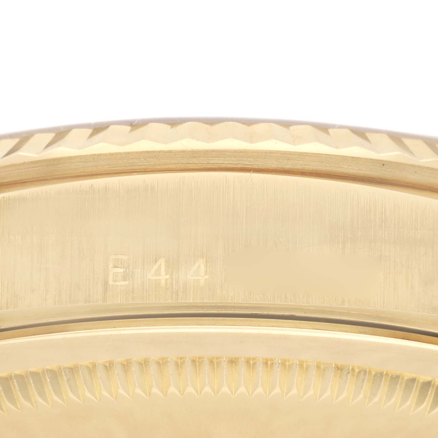 This image shows a close-up of the serial number engraving on the side of the President model by Rolex.