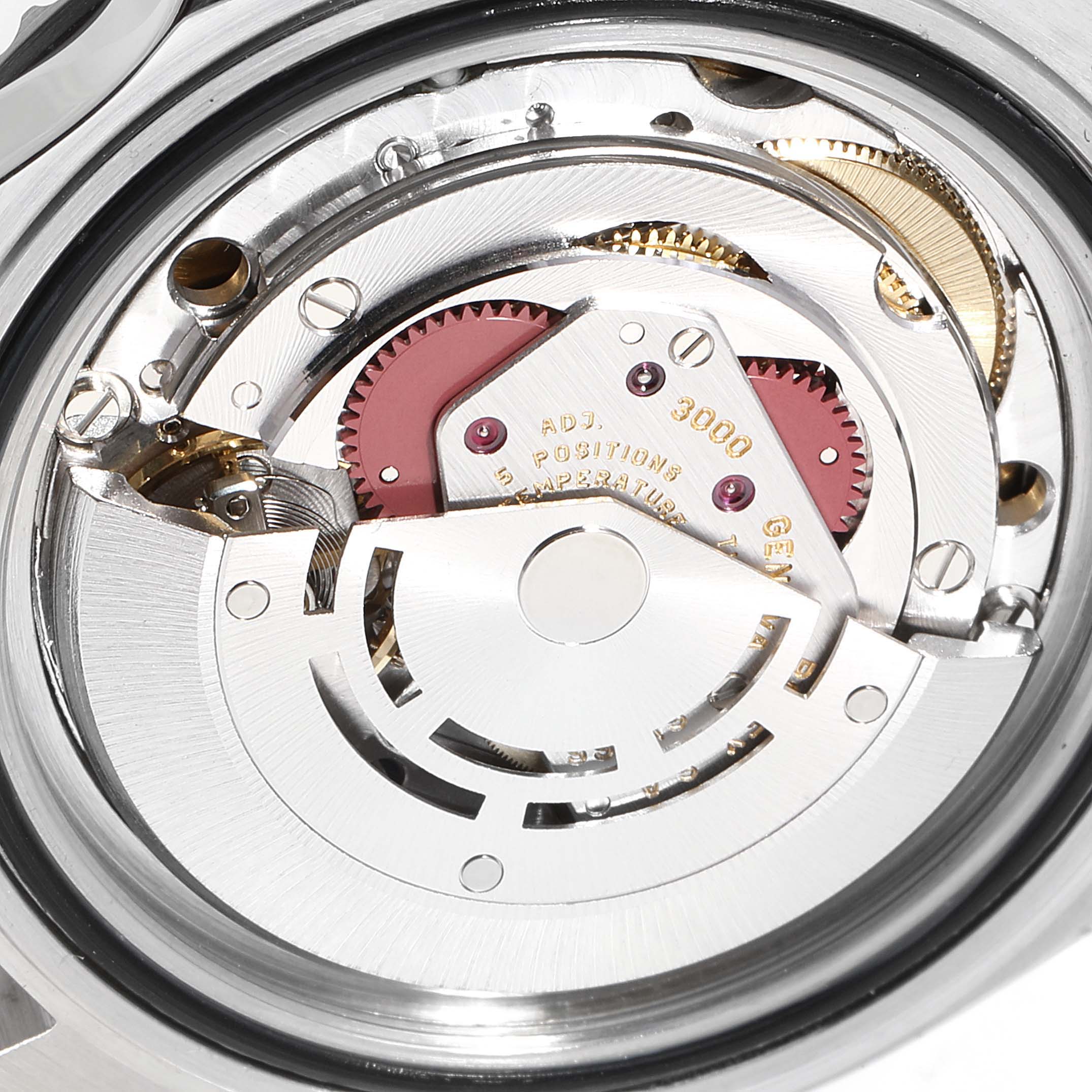 This image shows the internal movement mechanism of a Rolex Submariner 14060 Men
s Stainless Steel Black Dial 14060 Men
s Stainless Steel Black Dial watch from a top-down angle.