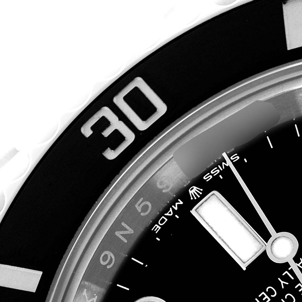 The image shows a close-up of a Rolex Submariner 126610 Men
s Stainless Steel Black Dial watch dial, focusing on the numeral "30" on the bezel and part of the dial.