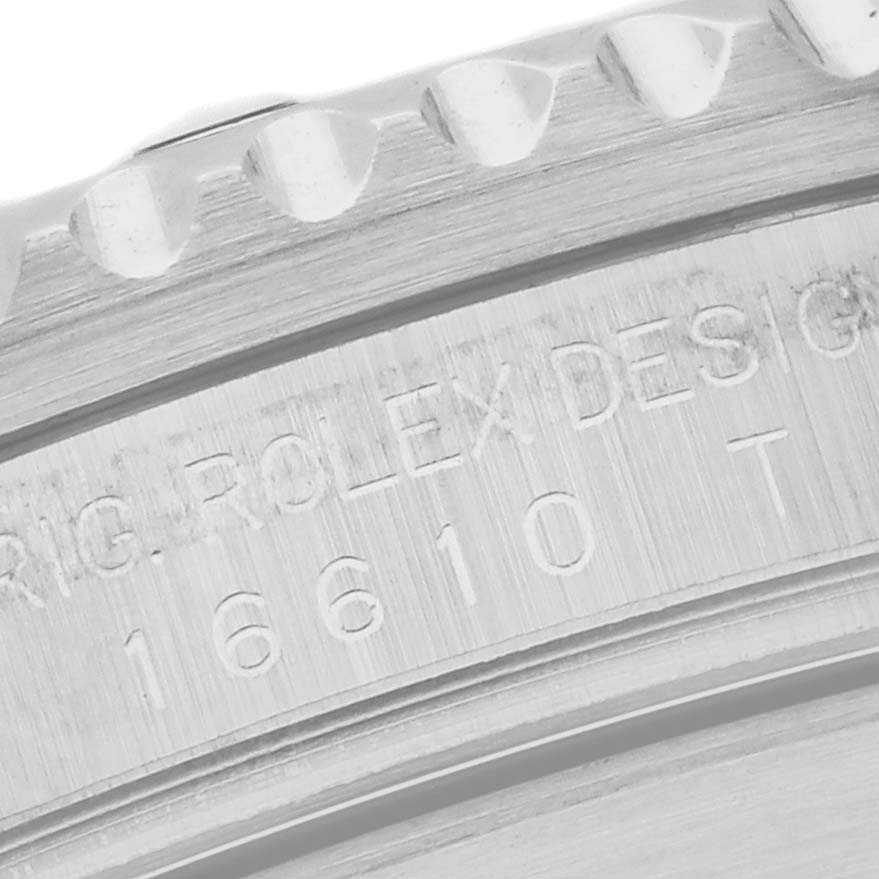 This image shows a close-up of the engraved model number on the side of a Rolex Submariner 16610 Men
s Stainless Steel Black Dial 16610 Men
s Stainless Steel Black Dial watch case.