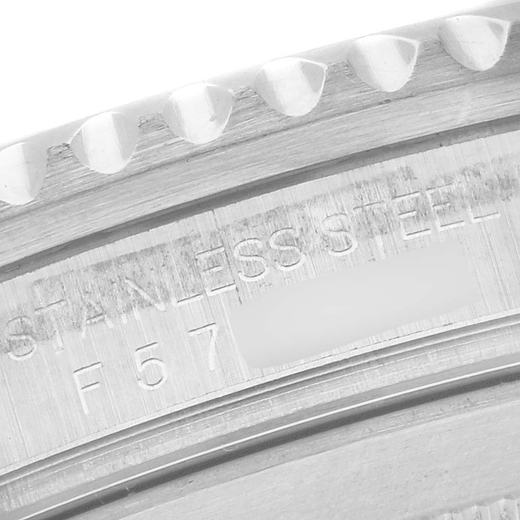 This close-up image shows the engraved stainless steel detail and bezel of the Rolex Submariner 16610 Men
s Stainless Steel Black Dial 16610 Men
s Stainless Steel Black Dial watch.