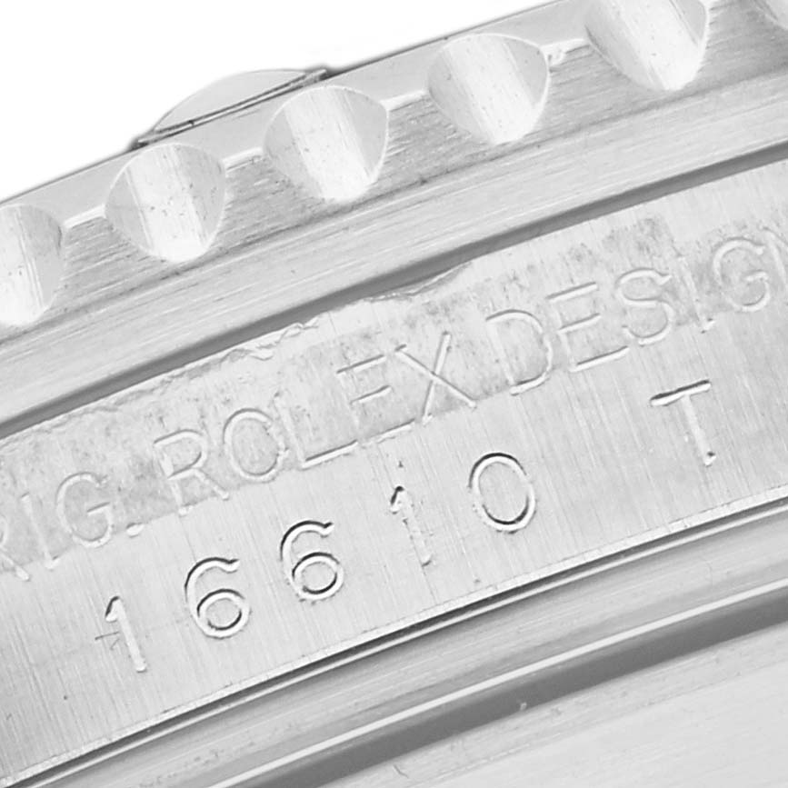 This image shows a close-up angle of the case side and engraved model number of a Rolex Submariner 16610 Men's Stainless Steel Black Dial 16610 Men's Stainless Steel Black Dial.