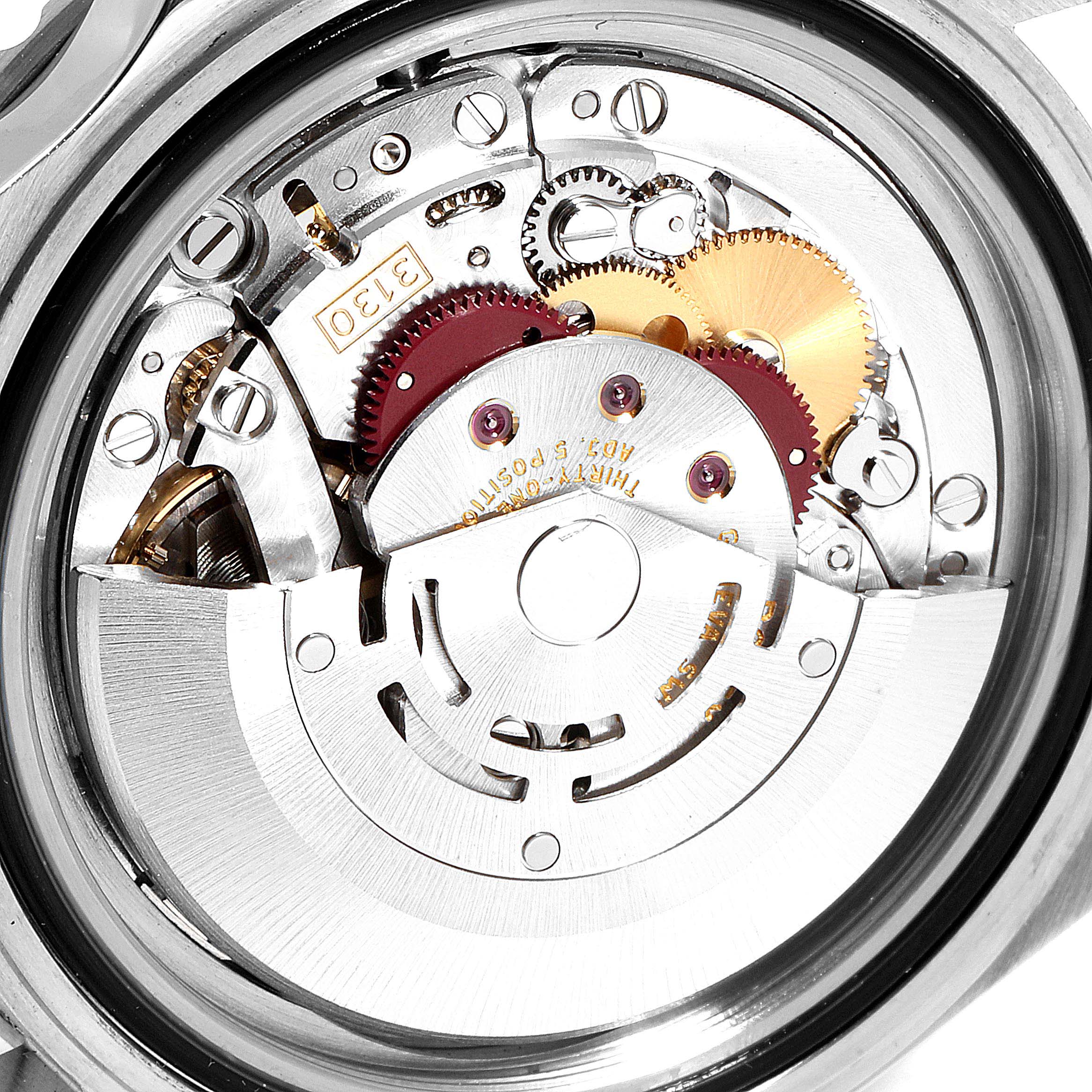 This image shows the internal mechanical parts of a Rolex Submariner 14060 Men's Stainless Steel Black Dial 14060 Men's Stainless Steel Black Dial watch from the caseback view.