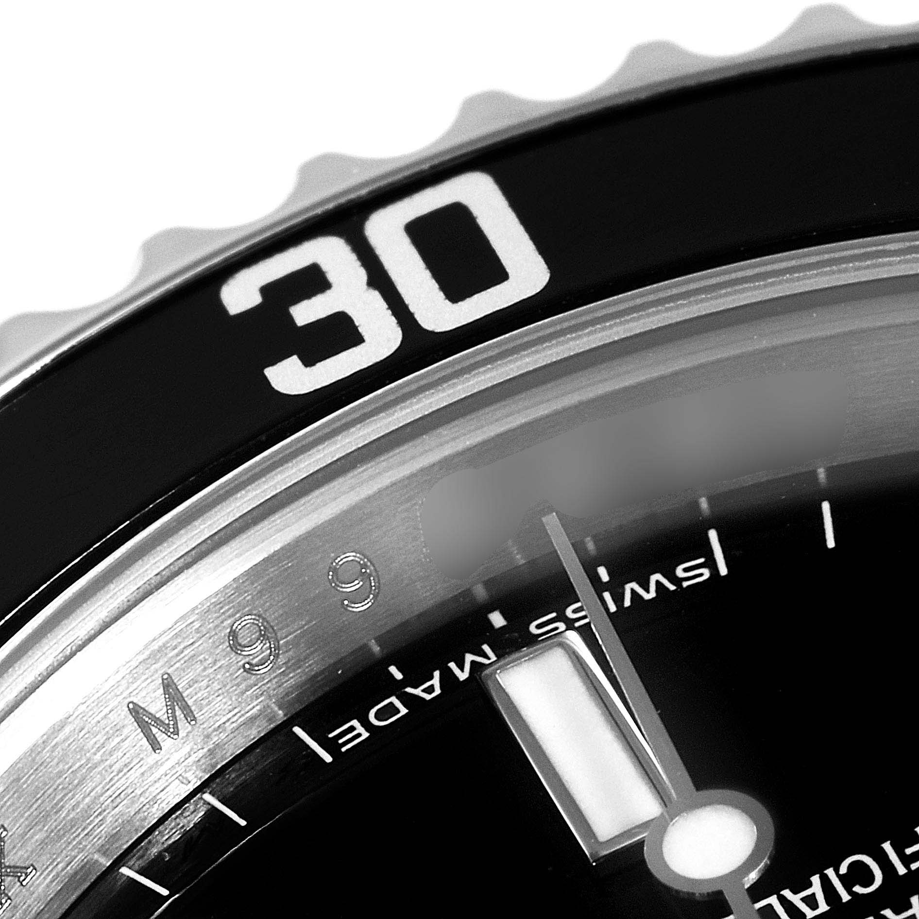 The image shows a close-up of the bezel, part of the dial, and the minute markers on a Rolex Submariner 14060 Men's Stainless Steel Black Dial 14060 Men's Stainless Steel Black Dial watch.