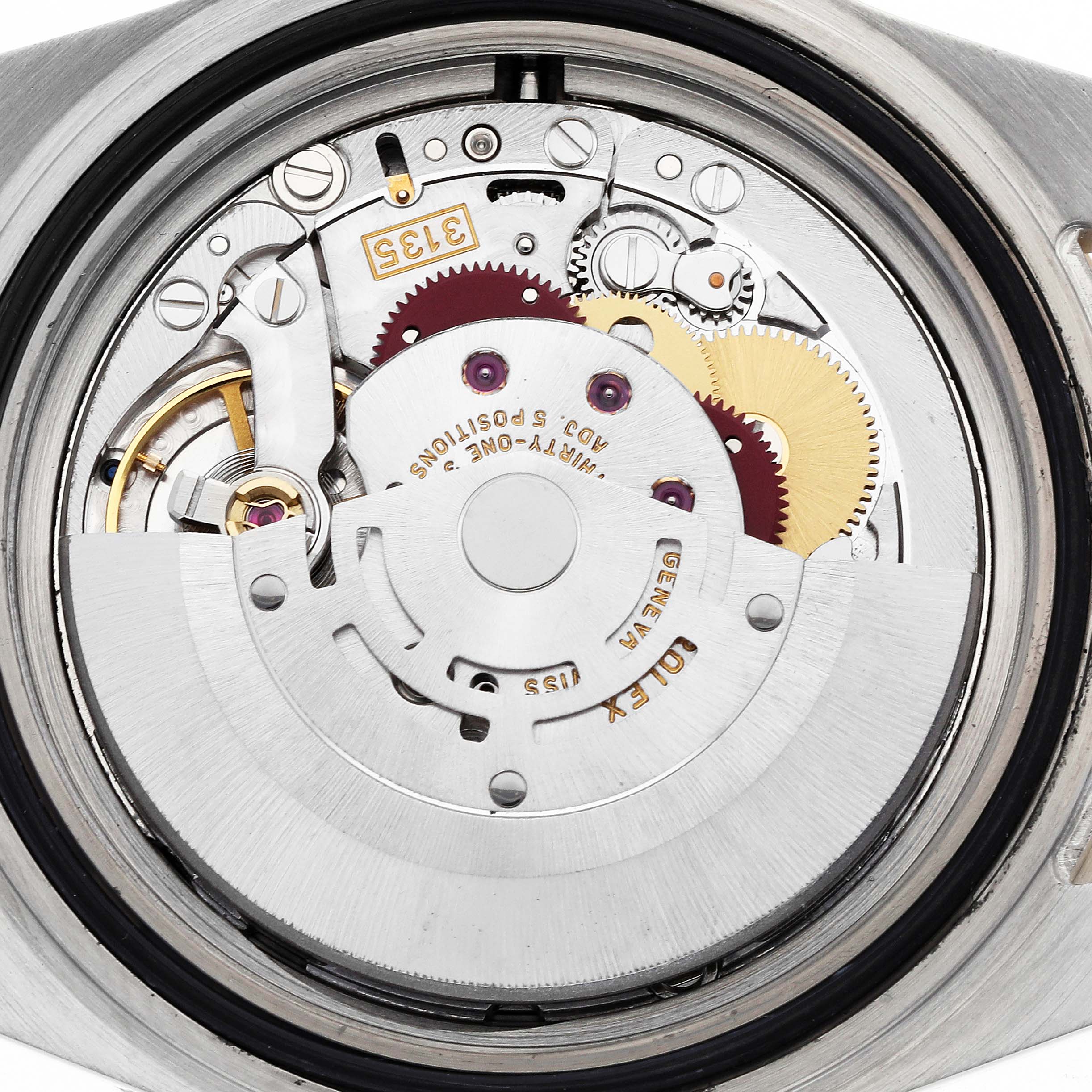 The image shows a close-up of the Rolex Submariner 16613 Men
s Steel and Gold (two tone) Blue Dial
s movement, displaying gears and mechanical components from the back view.