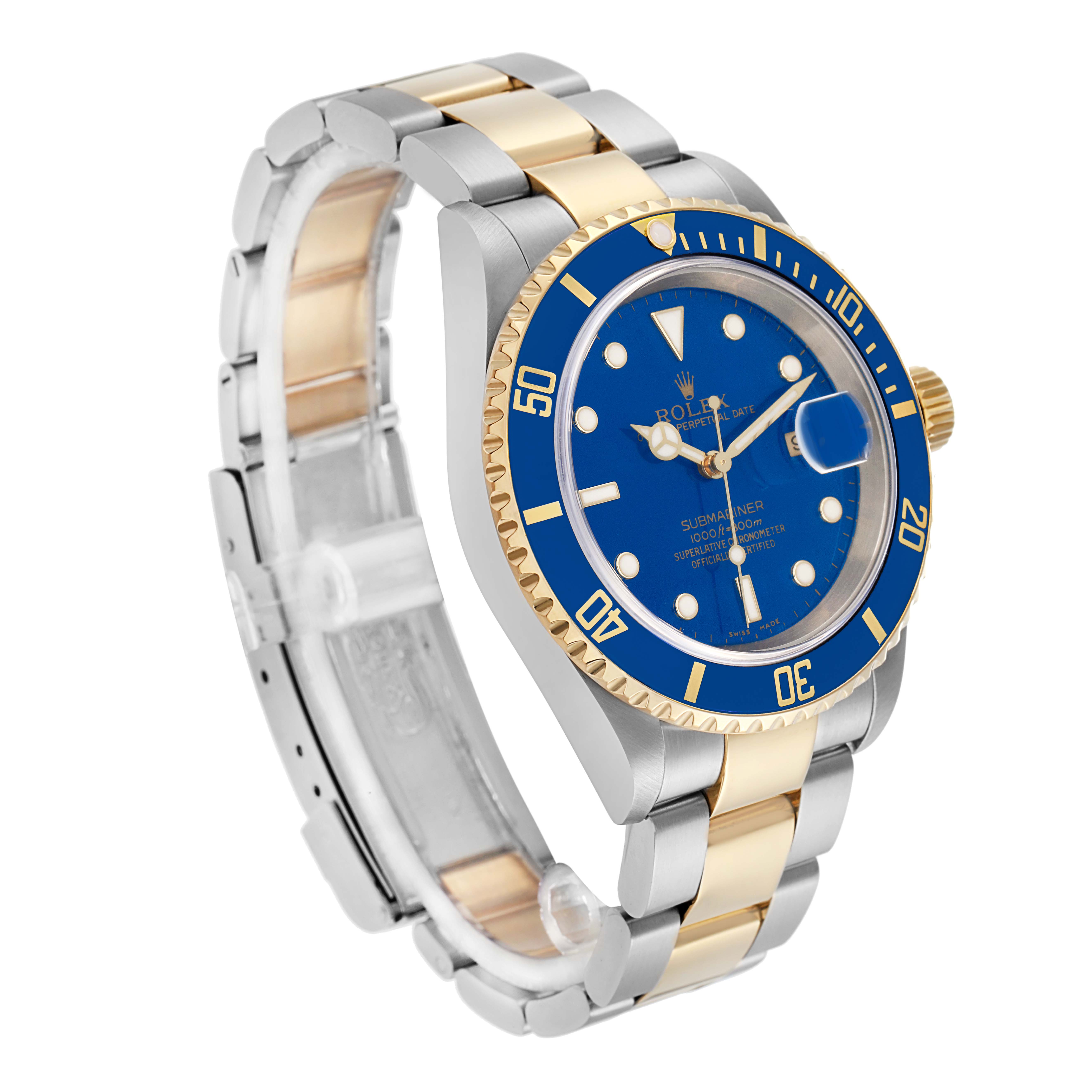 The Rolex Submariner 16613 Men
s Steel and Gold (two tone) Blue Dial watch is shown from a three-quarter angle, highlighting its blue dial, bezel, and two-tone band.