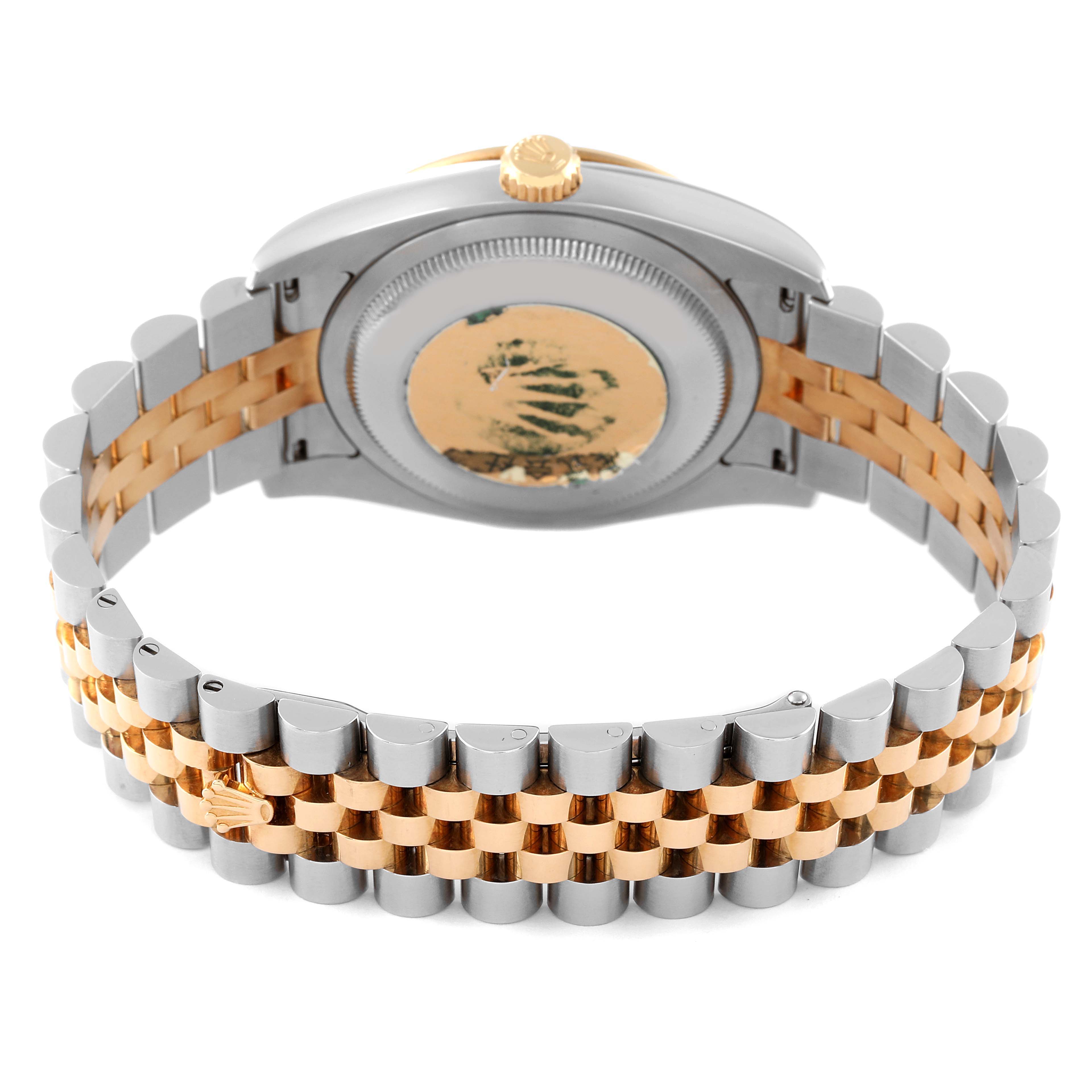 The image shows the back case and bracelet of a Rolex Turn-o-Graph 116263 Men
s Steel and Gold (two tone) Grey Dial 116263 Men
s Steel and Gold (two tone) Grey Dial watch, featuring a two-tone metal design.
