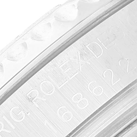 The image shows a close-up of the stainless steel bezel and engraved side of the Rolex Yacht-Master 168622 Men's Stainless Steel Silver Dial 168622 Men's Stainless Steel Silver Dial watch.