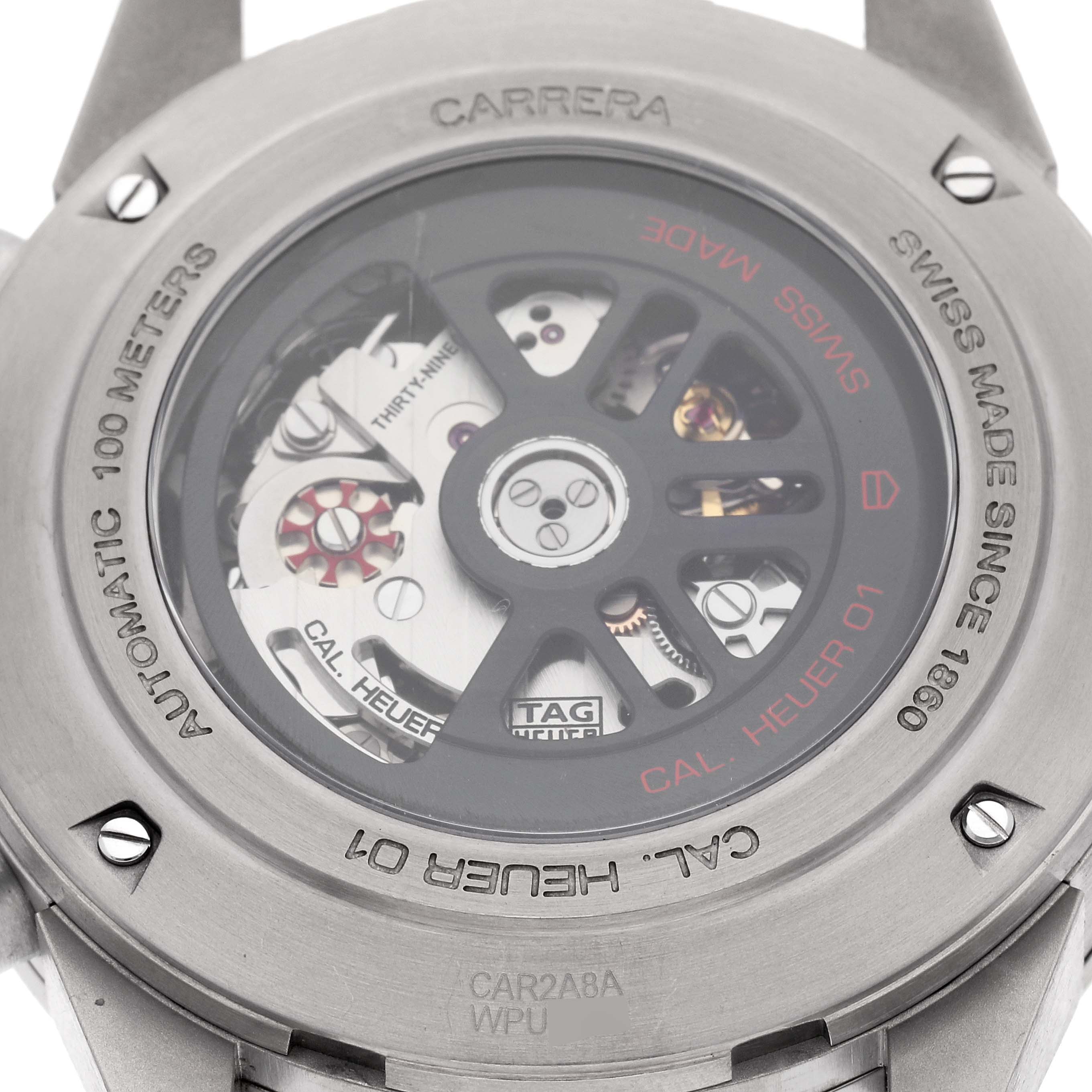 This image shows the back case of a Tag Heuer Carrera CAR2A8A.BF0707 Men's Titanium Grey Dial CAR2A8A.BF0707 Men's Titanium Grey Dial watch, highlighting its automatic movement and inner mechanics.