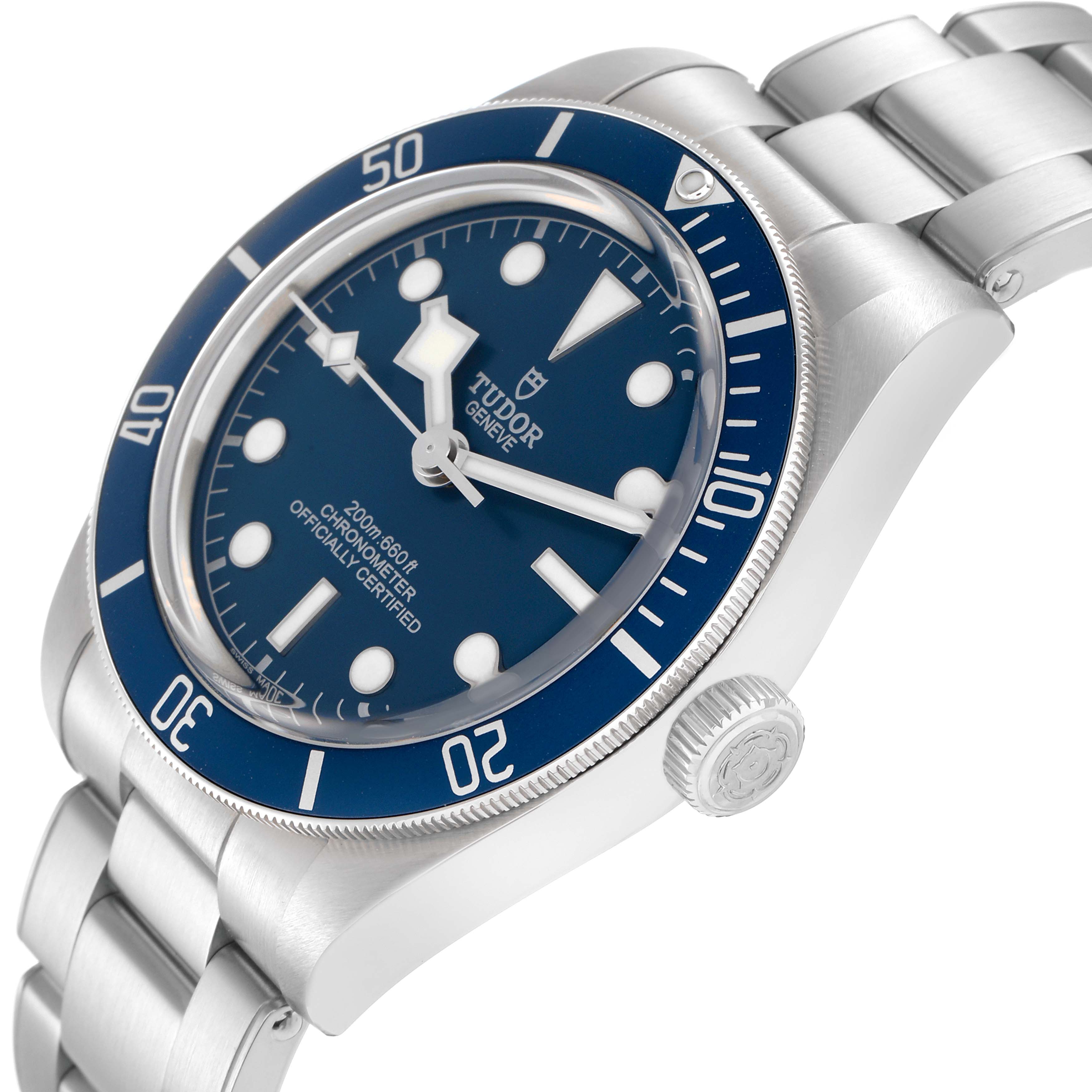 The image shows a Tudor Heritage Black Bay 79030B Men
s Stainless Steel Blue Dial watch at a slight angle, highlighting the face, bezel, crown, and bracelet.