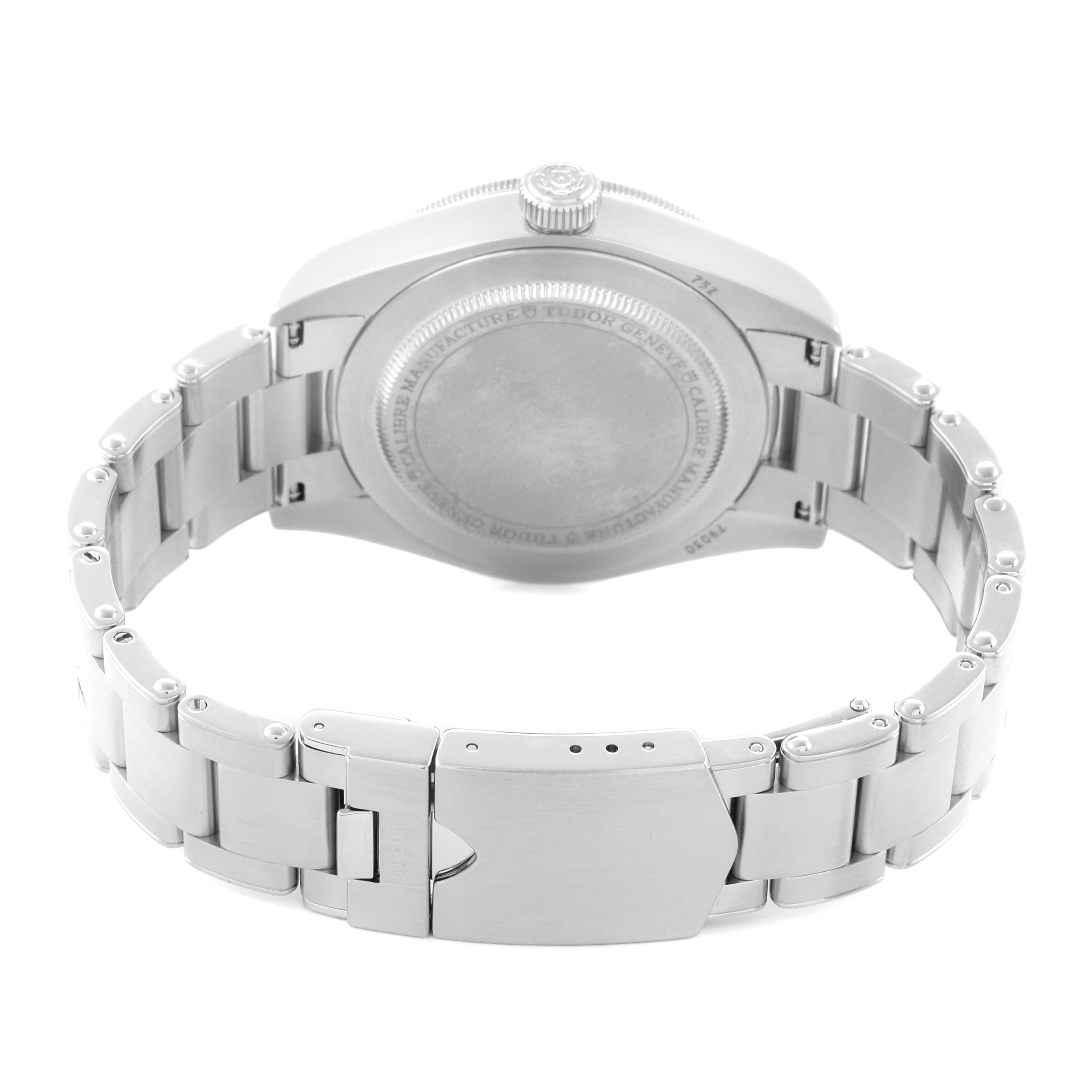 The image shows the back of a Tudor Heritage Black Bay 79030B Men
s Stainless Steel Blue Dial watch, including the case back, crown, and bracelet.