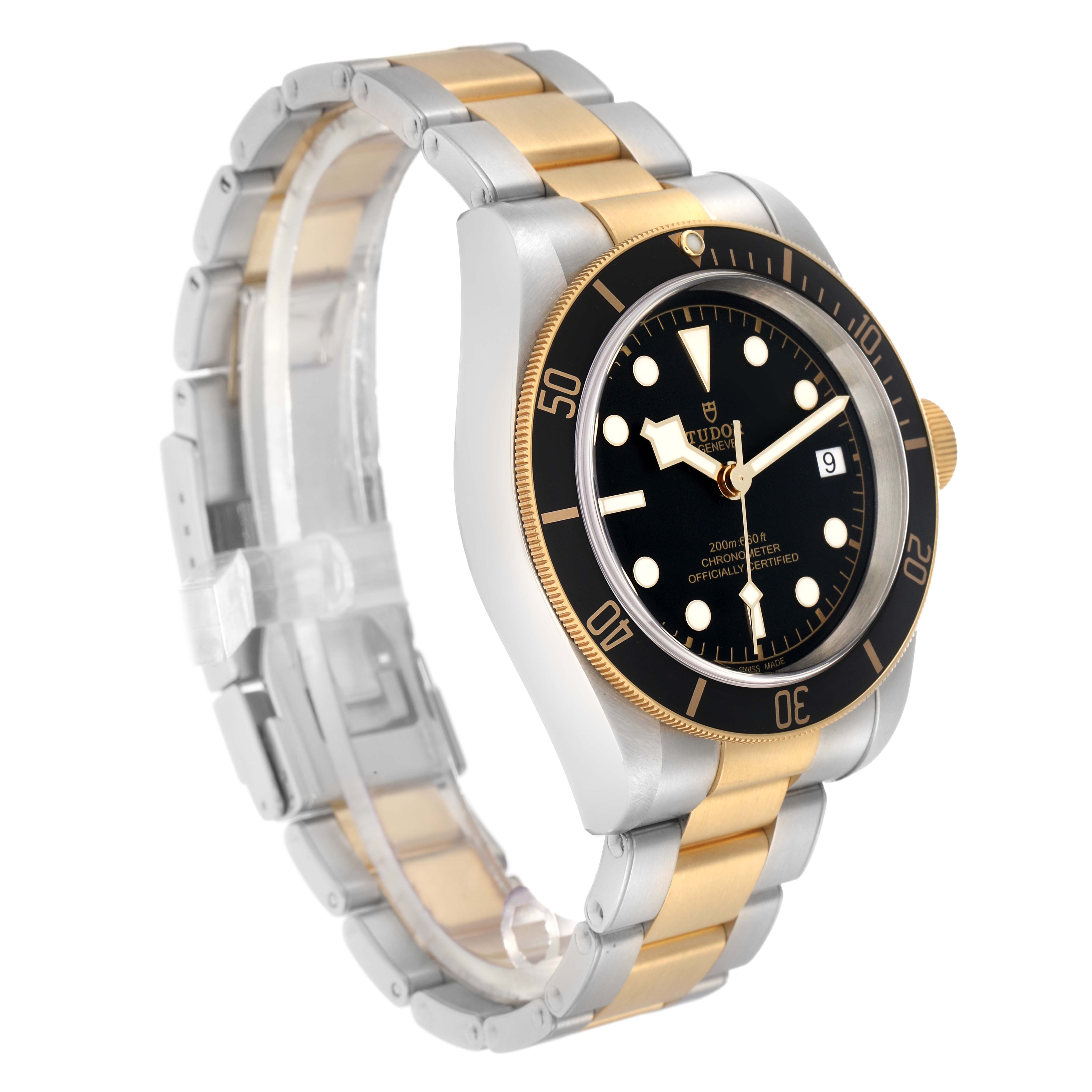 The Tudor Heritage Black Bay 79733 Men
s Steel and Gold (two tone) Black Dial watch is shown at a three-quarter angle, displaying its bezel, dial, and two-tone bracelet.