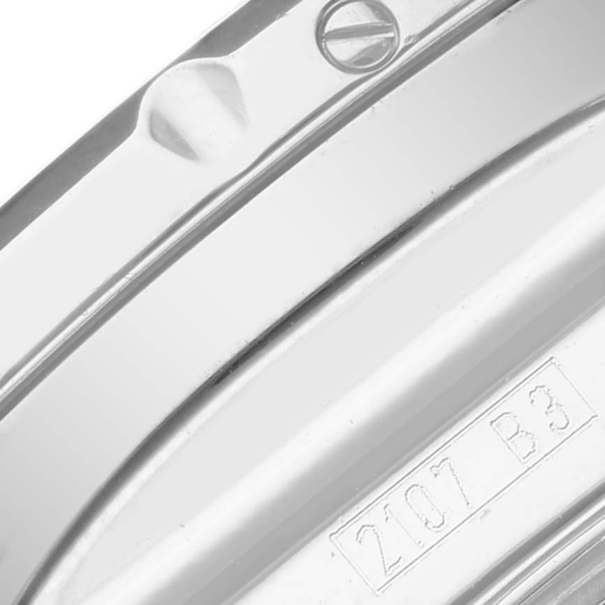 The image shows a close-up of the side casing and bezel screws of a Bentley model by Breitling.