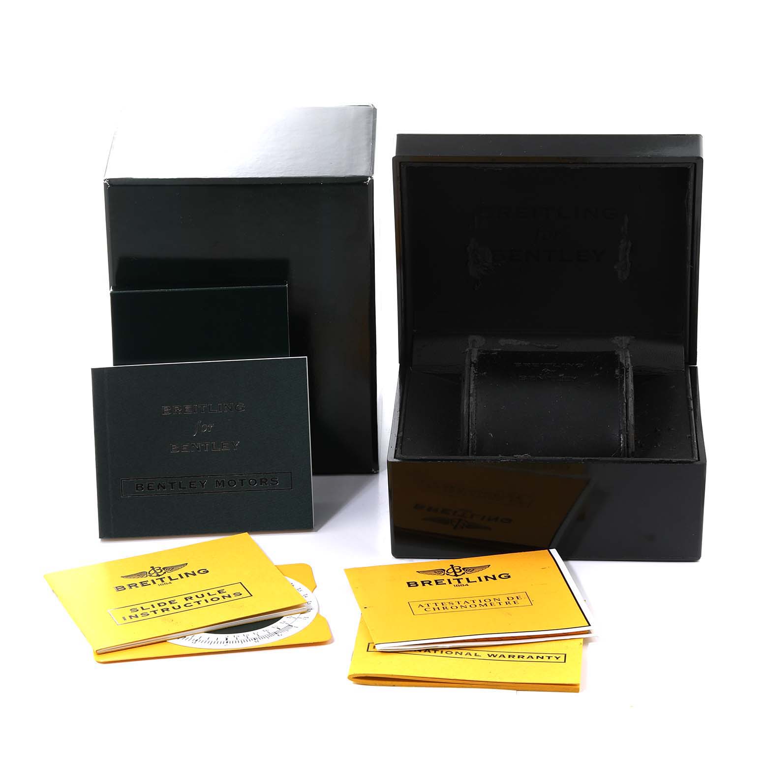 The image shows the Breitling Bentley A25363 Men
s Stainless Steel Brown Dial A25363 Men
s Stainless Steel Brown Dial watch packaging and accessories, including boxes and booklets, viewed from the front.