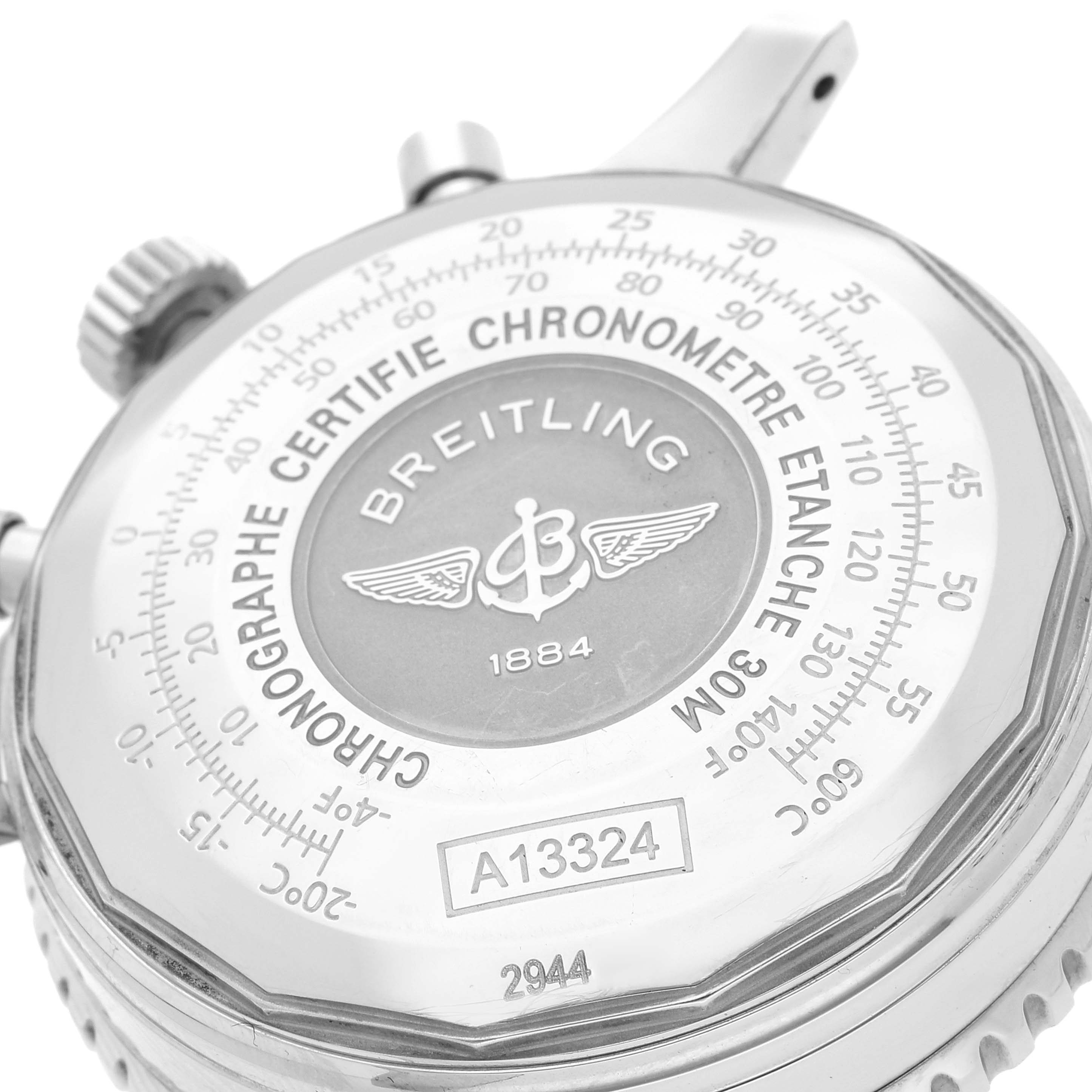 The image shows the back of a Breitling Navitimer A13324 Men
s Stainless Steel Blue Dial A13324 Men
s Stainless Steel Blue Dial watch at a slight angle, highlighting the brand
s logo, text, and model number.