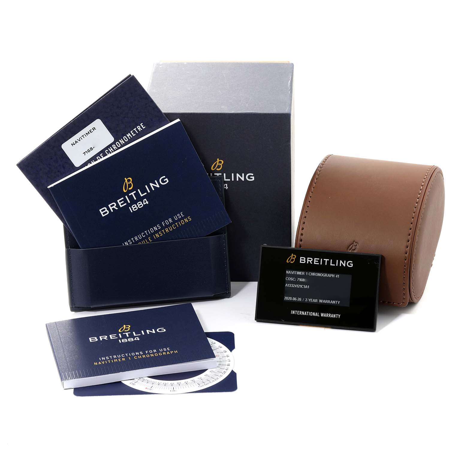 The image shows Breitling Navitimer A13324 Men's Stainless Steel Blue Dial A13324 Men's Stainless Steel Blue Dial watch accessories, including manuals, an international warranty card, a box, and a brown leather case.