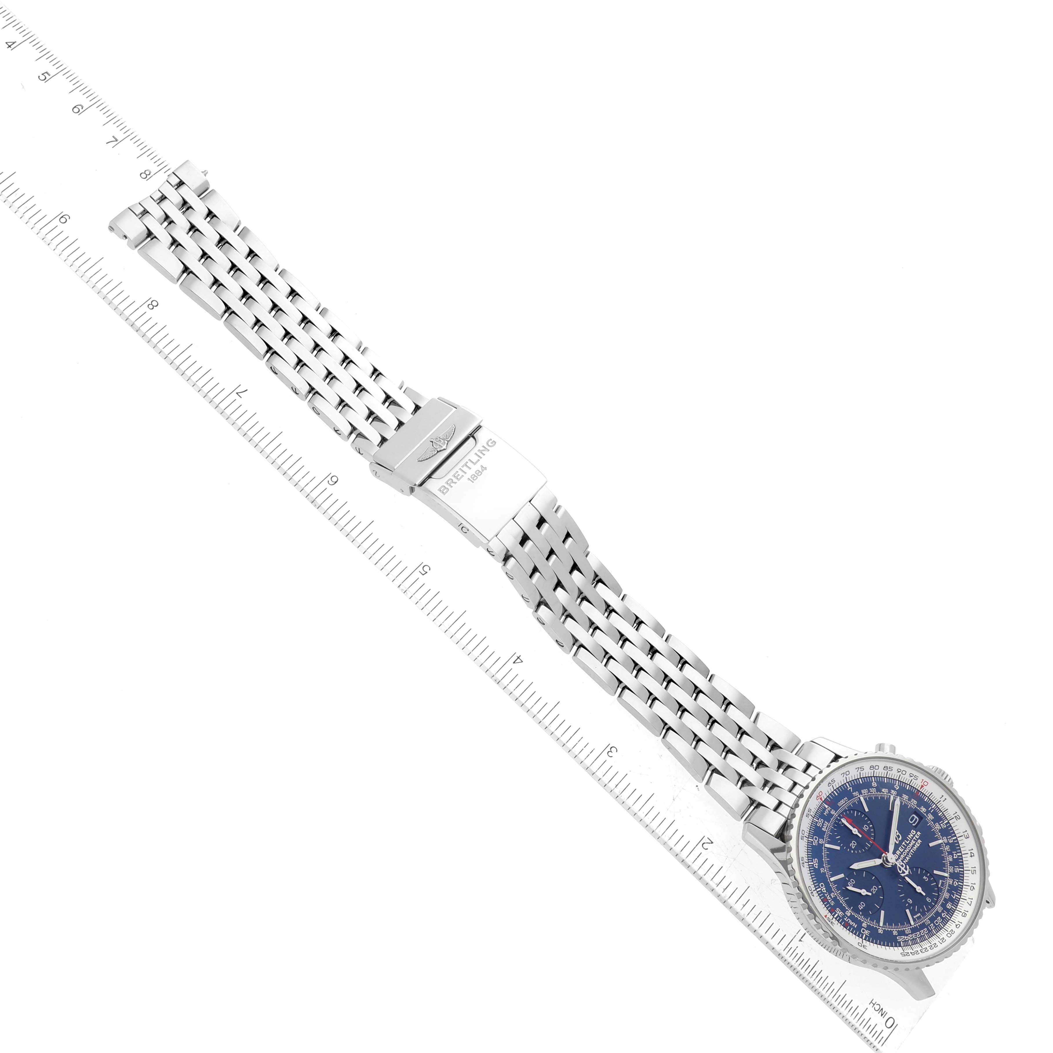 The Breitling Navitimer A13324 Men's Stainless Steel Blue Dial A13324 Men's Stainless Steel Blue Dial watch is shown flat, displaying its blue dial, stainless steel band, and clasp with a ruler for scale.