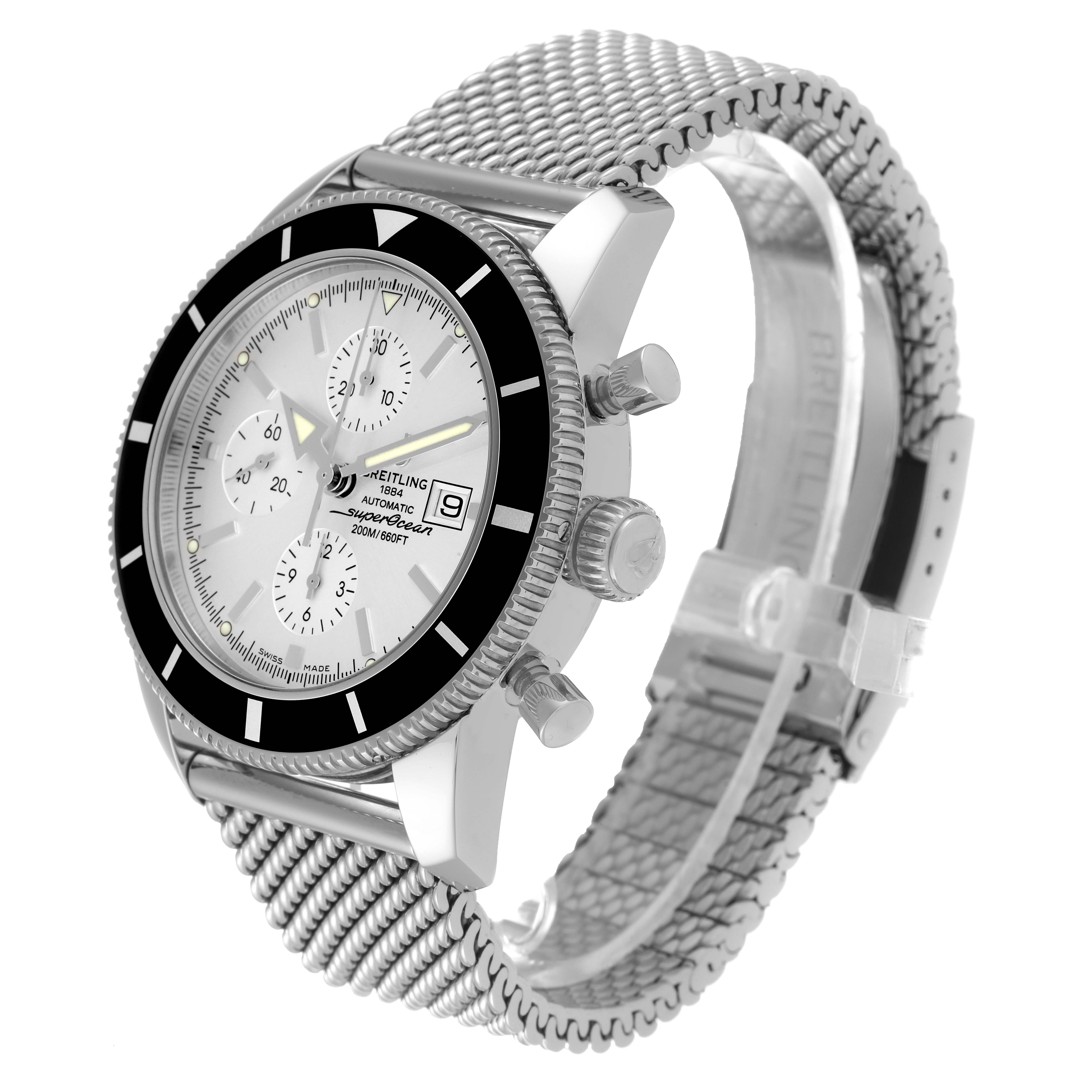 This image shows a side angle view of a Breitling Superocean A13320 Men's Stainless Steel Silver Dial A13320 Men's Stainless Steel Silver Dial watch, highlighting its face, bezel, crown, and mesh strap.