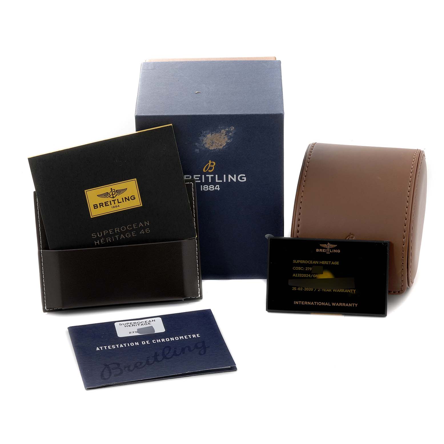 The image shows packaging, manuals, warranty card, and a pouch for a Breitling Superocean A13320 Men's Stainless Steel Silver Dial A13320 Men's Stainless Steel Silver Dial Heritage 46 watch.