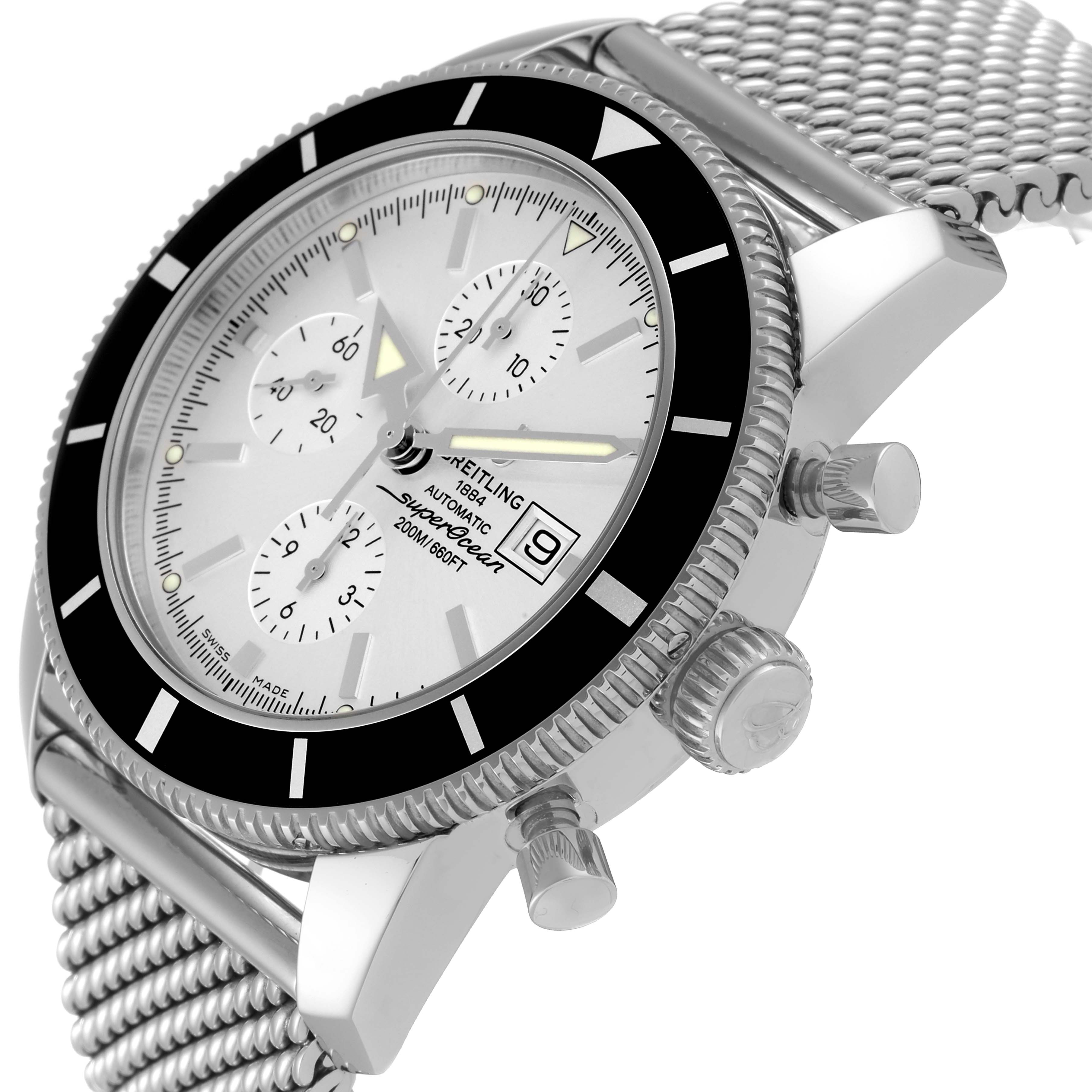 This image shows a side angle of the Breitling Superocean A13320 Men's Stainless Steel Silver Dial A13320 Men's Stainless Steel Silver Dial watch, highlighting its bezel, dial, subdials, and mesh bracelet.