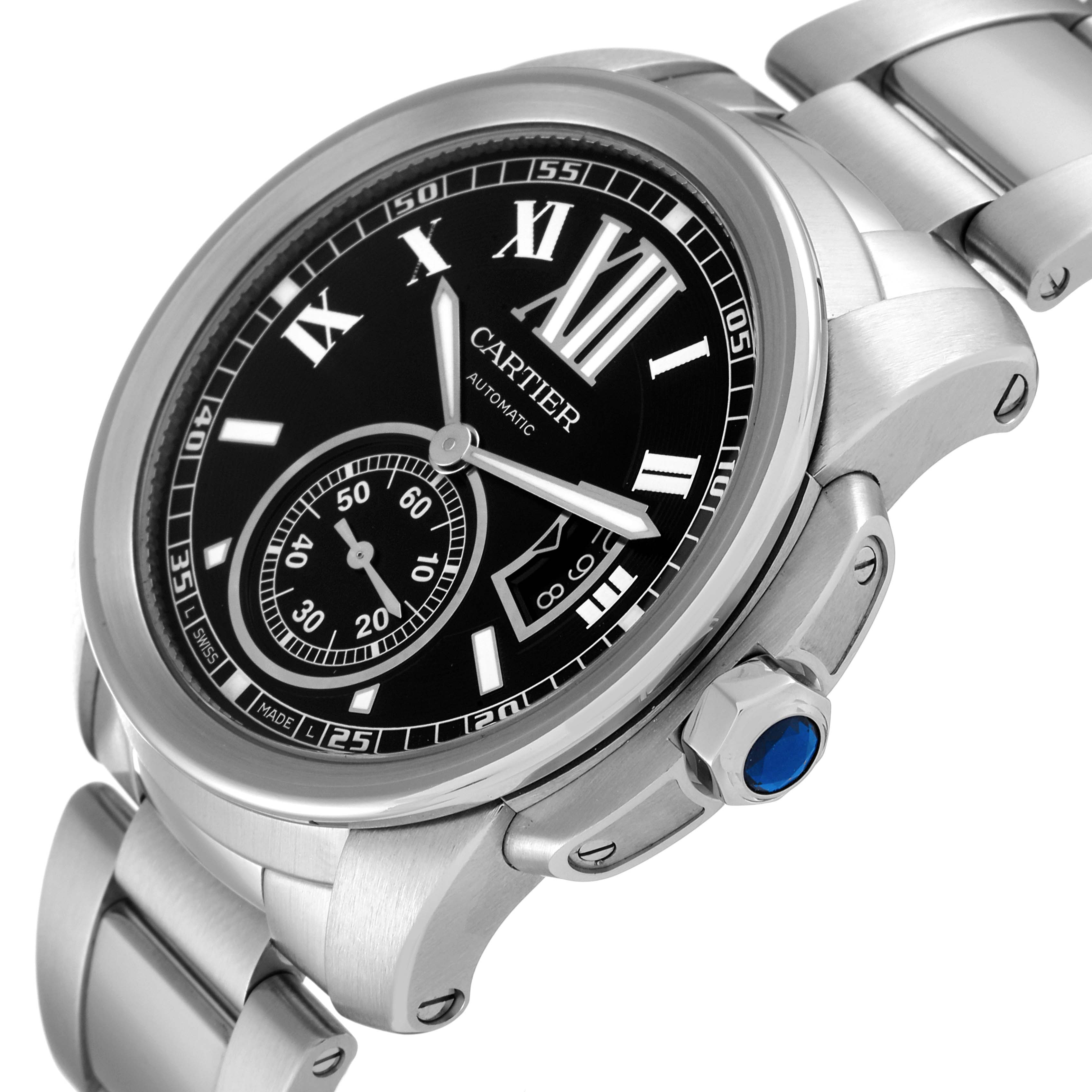 The image shows a Calibre de Cartier watch by Cartier at an angled view, displaying its face, bezel, crown, and part of the bracelet.