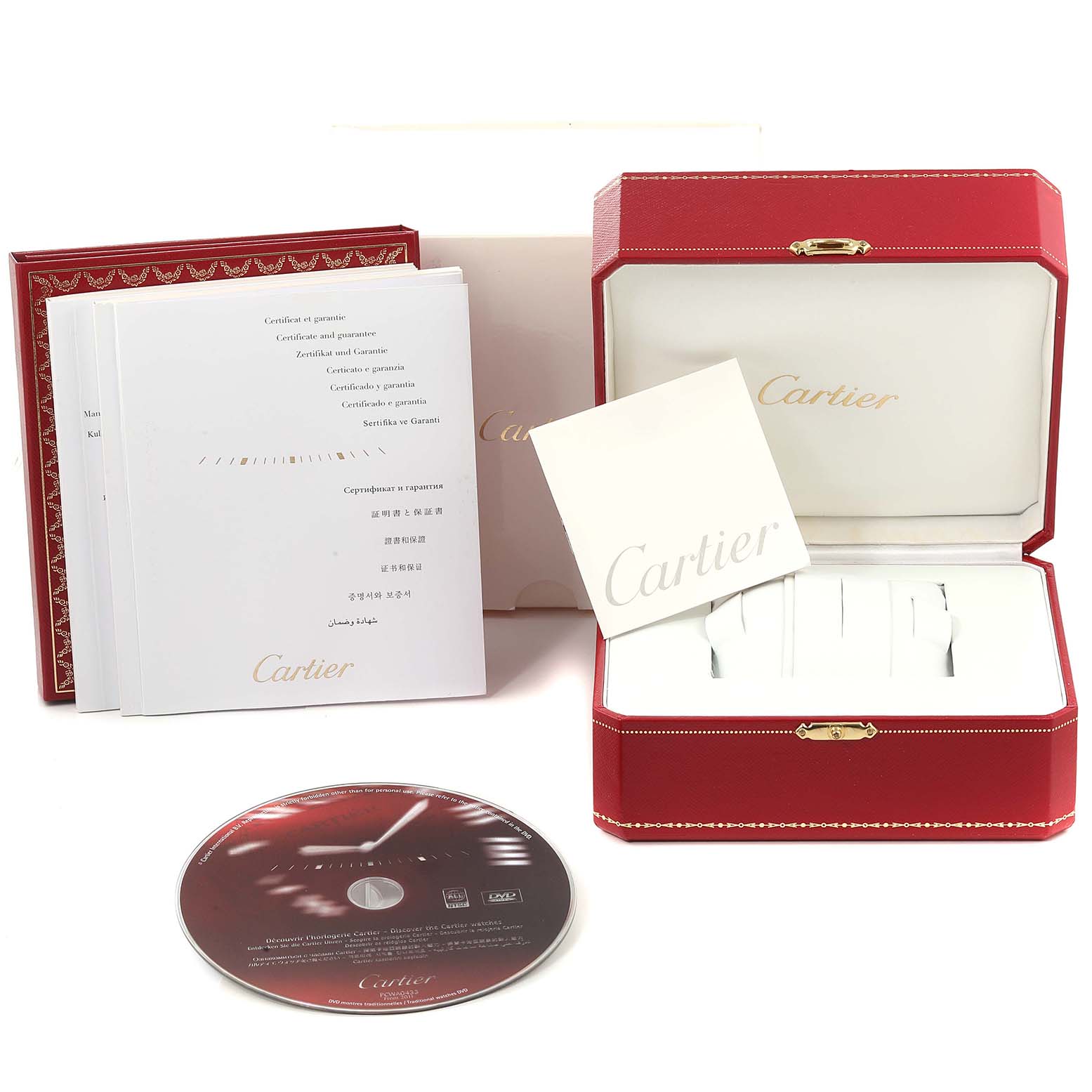 The image shows the packaging, manuals, and a CD of the Calibre de Cartier watch by Cartier, but not the watch itself.