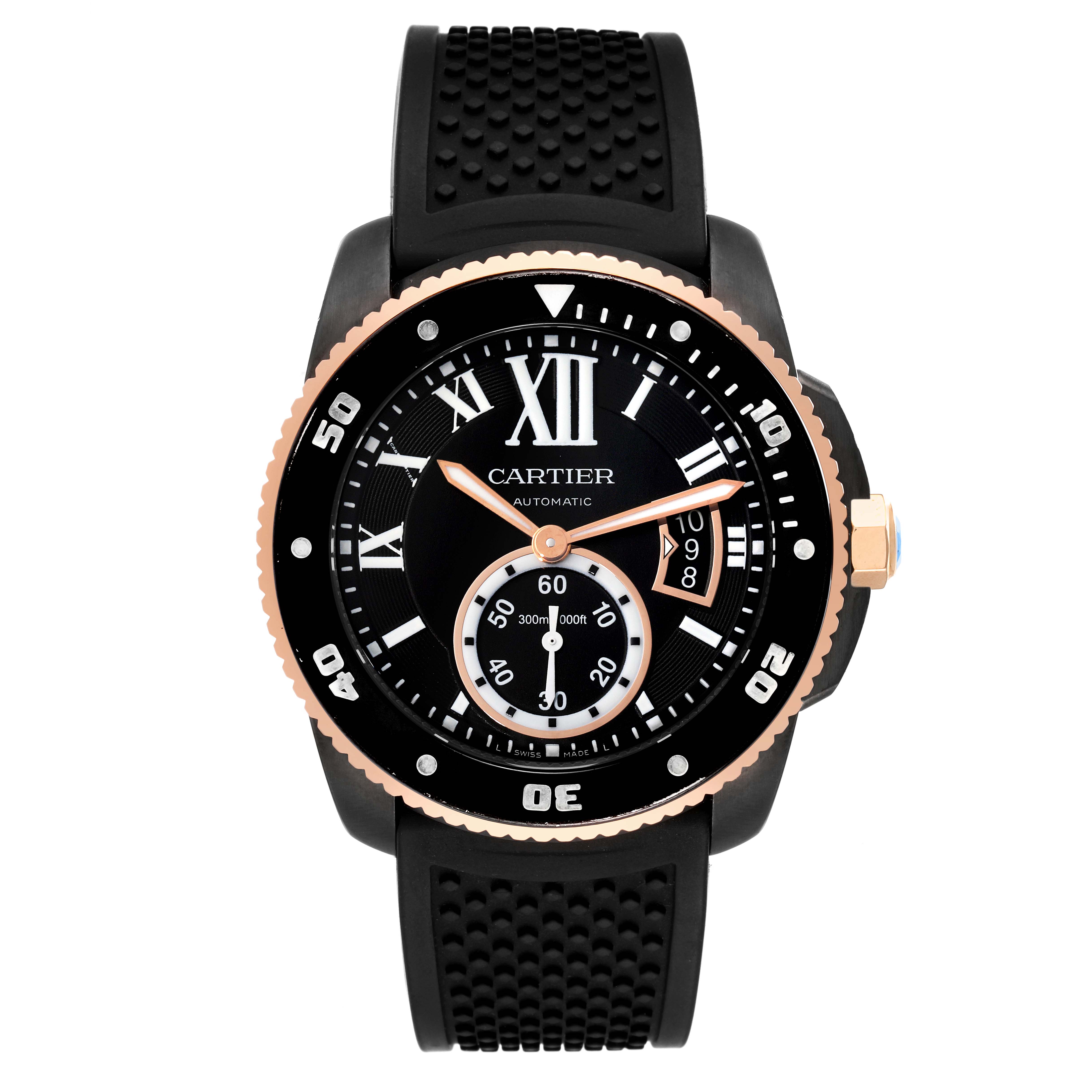 The image shows a front view of the Calibre de Cartier watch by Cartier, highlighting its black dial, rose gold bezel, and rubber strap.
