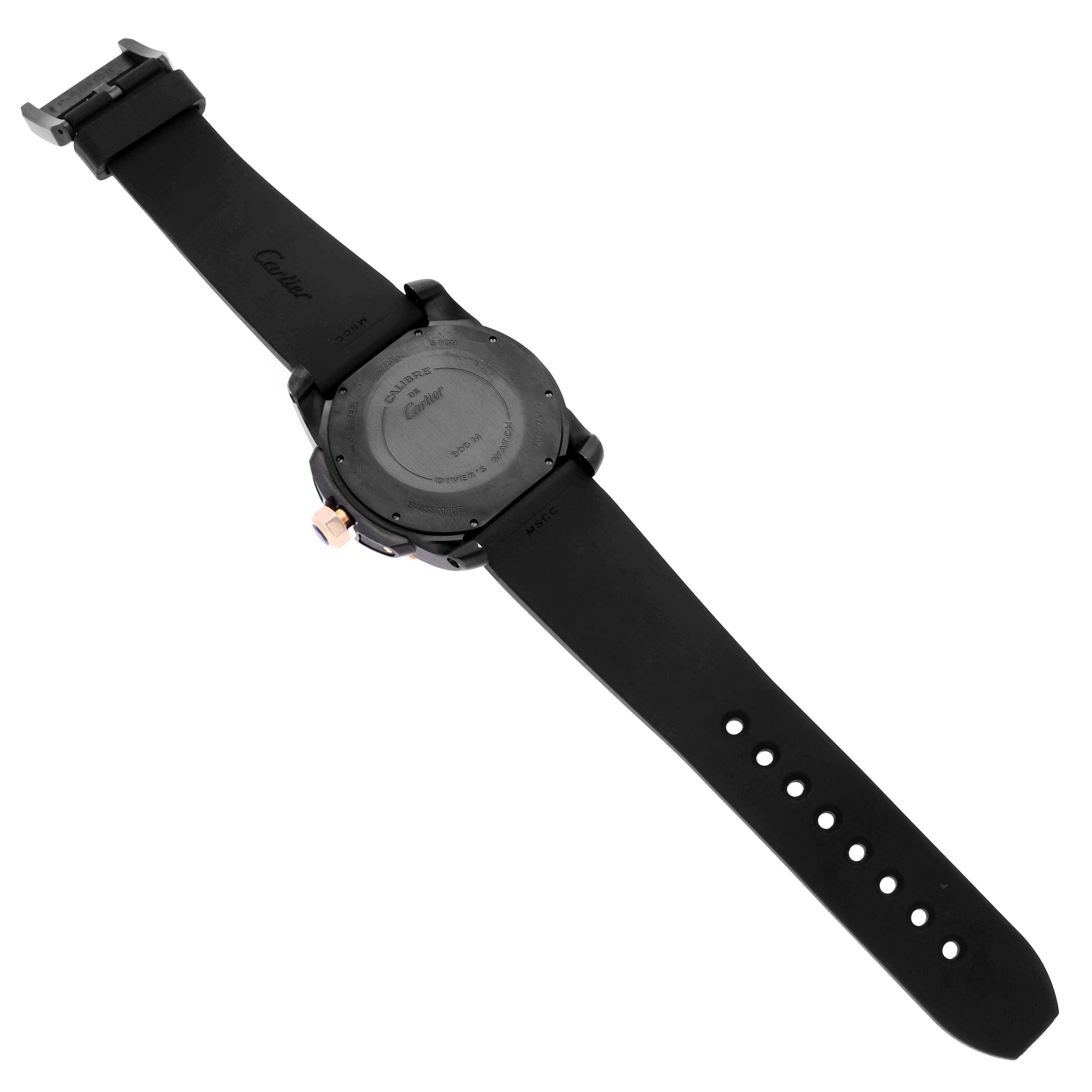 The image shows the back view of a Calibre de Cartier watch by Cartier, displaying the case back and full strap.