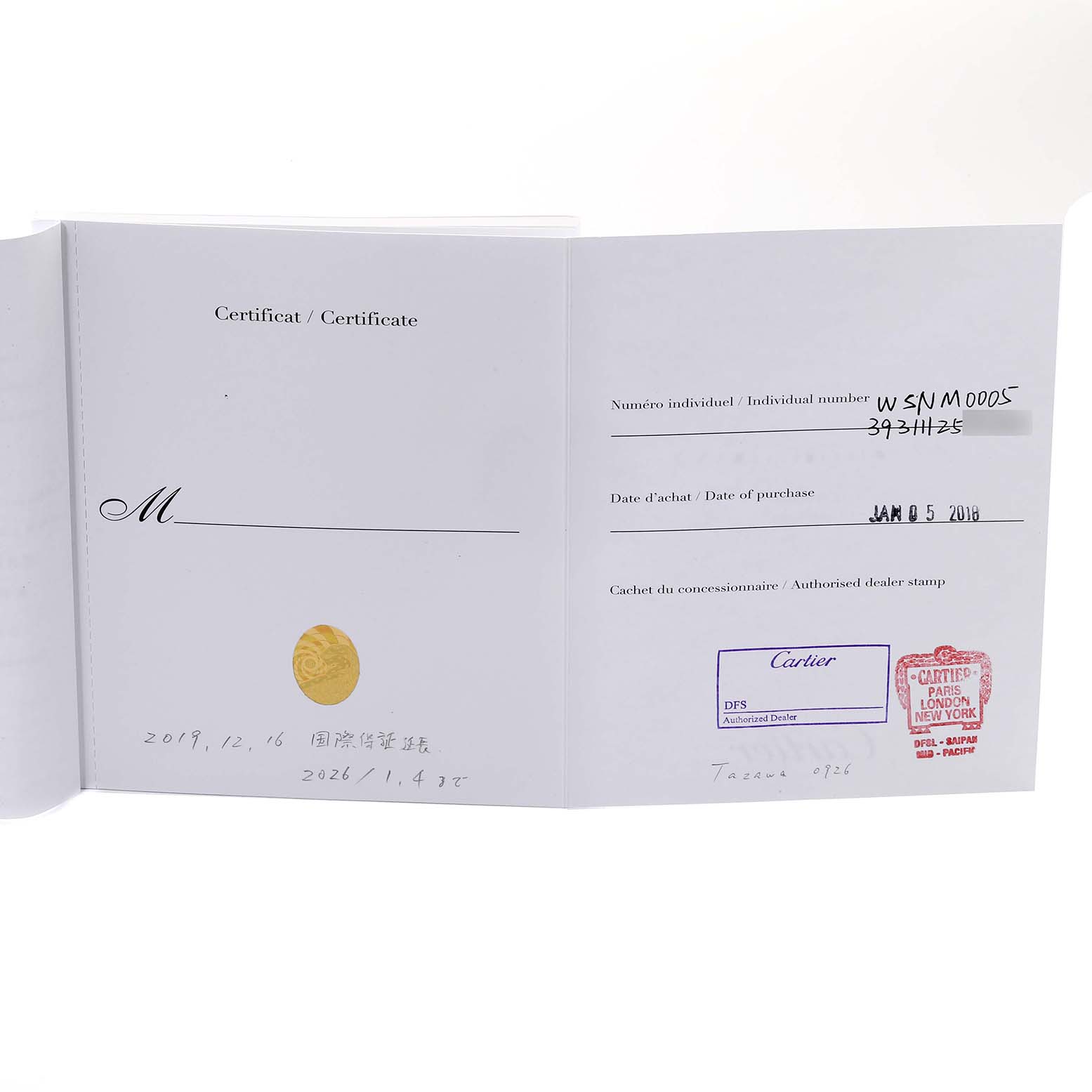 This image shows the certification booklet for the Drive de Cartier model by Cartier, including dealer stamps and purchase details.