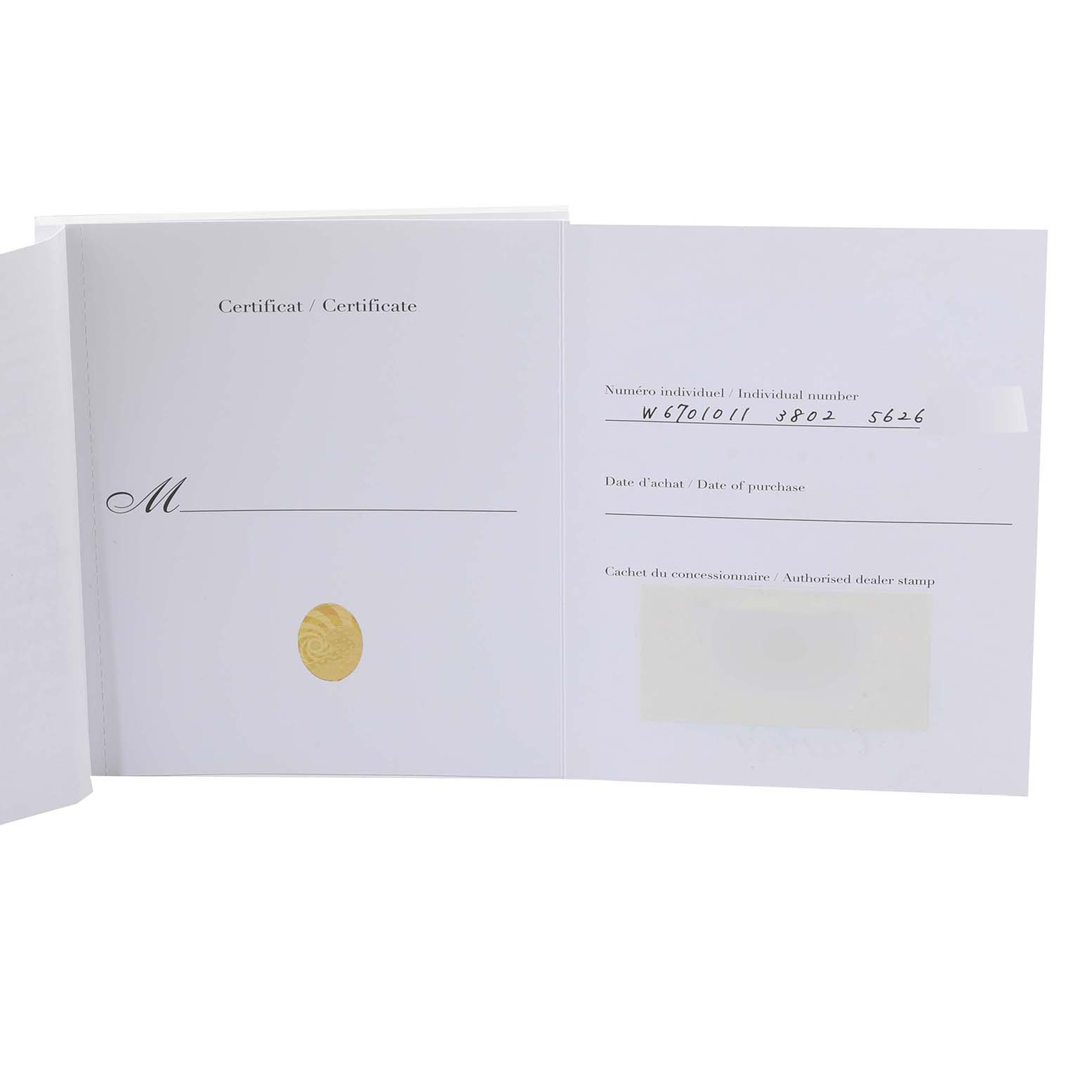 The image shows the open warranty certificate booklet for the Cartier Ronde W6701011 Men
s Stainless Steel Silver Dial W6701011 Men
s Stainless Steel Silver Dial model watch.