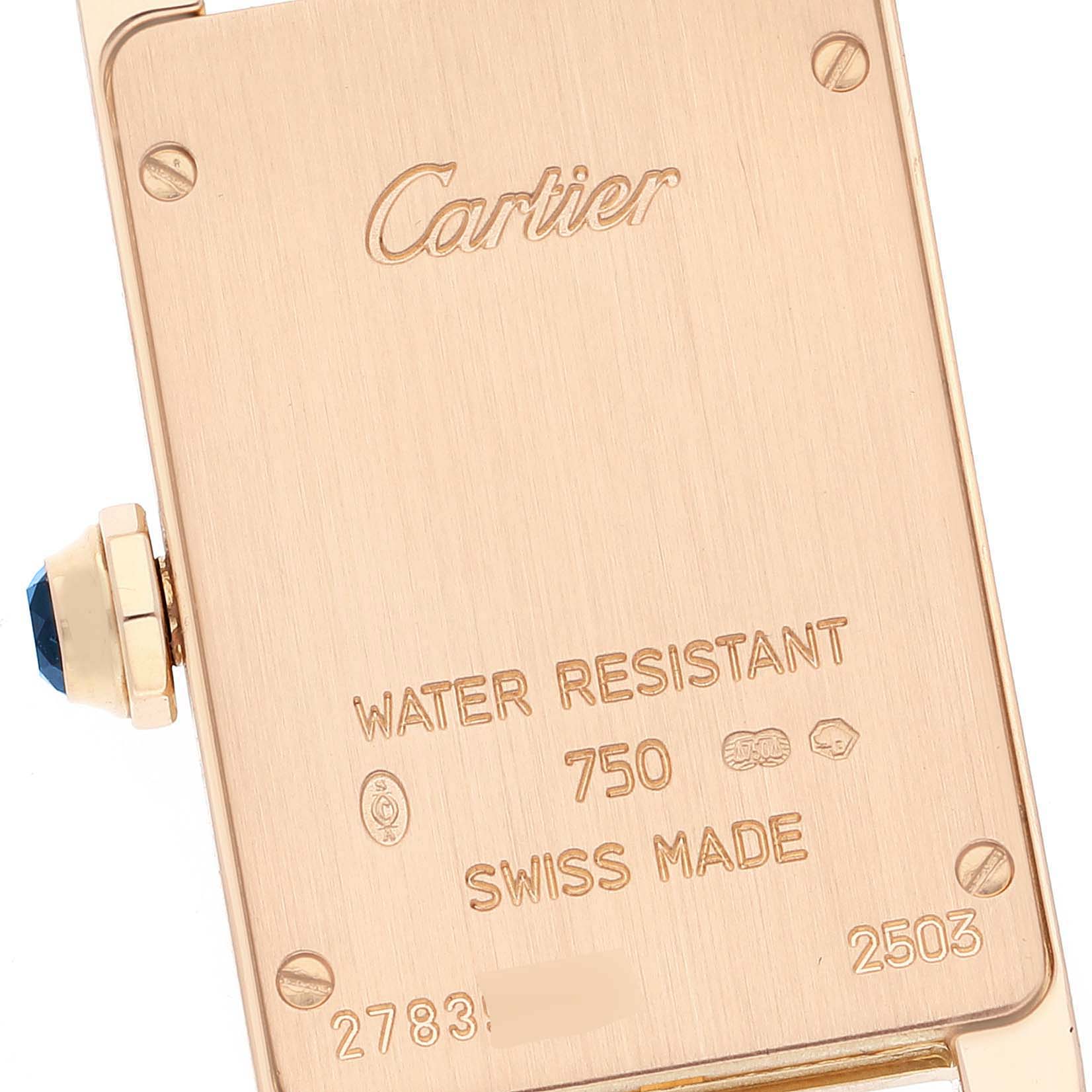 This image shows the case back of a Cartier Tank Americaine W2607056 Women's Rose Gold Silver Dial W2607056 Women's Rose Gold Silver Dial watch, highlighting the brand engraving and specifications.