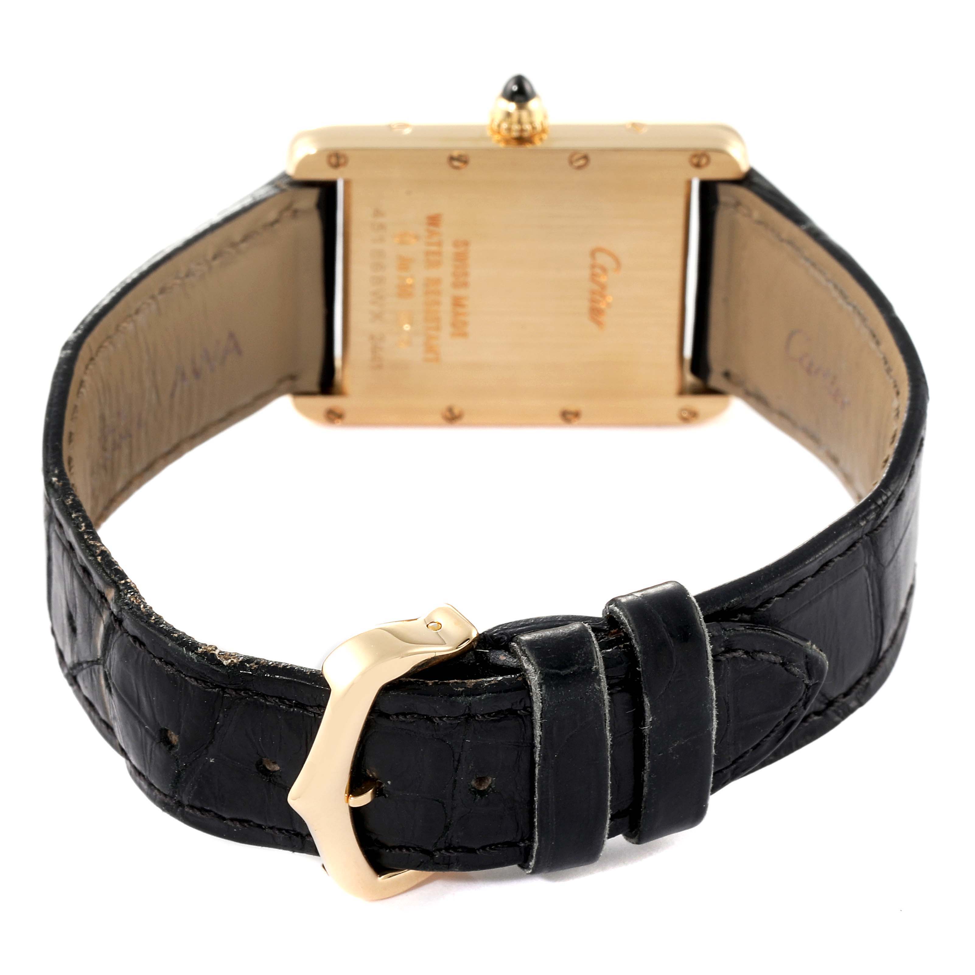 The image shows the back view of a Cartier Tank Louis W1529756 Men
s Yellow Gold Silver Dial W1529756 Men
s Yellow Gold Silver Dial watch, highlighting the clasp, case back, and leather strap.