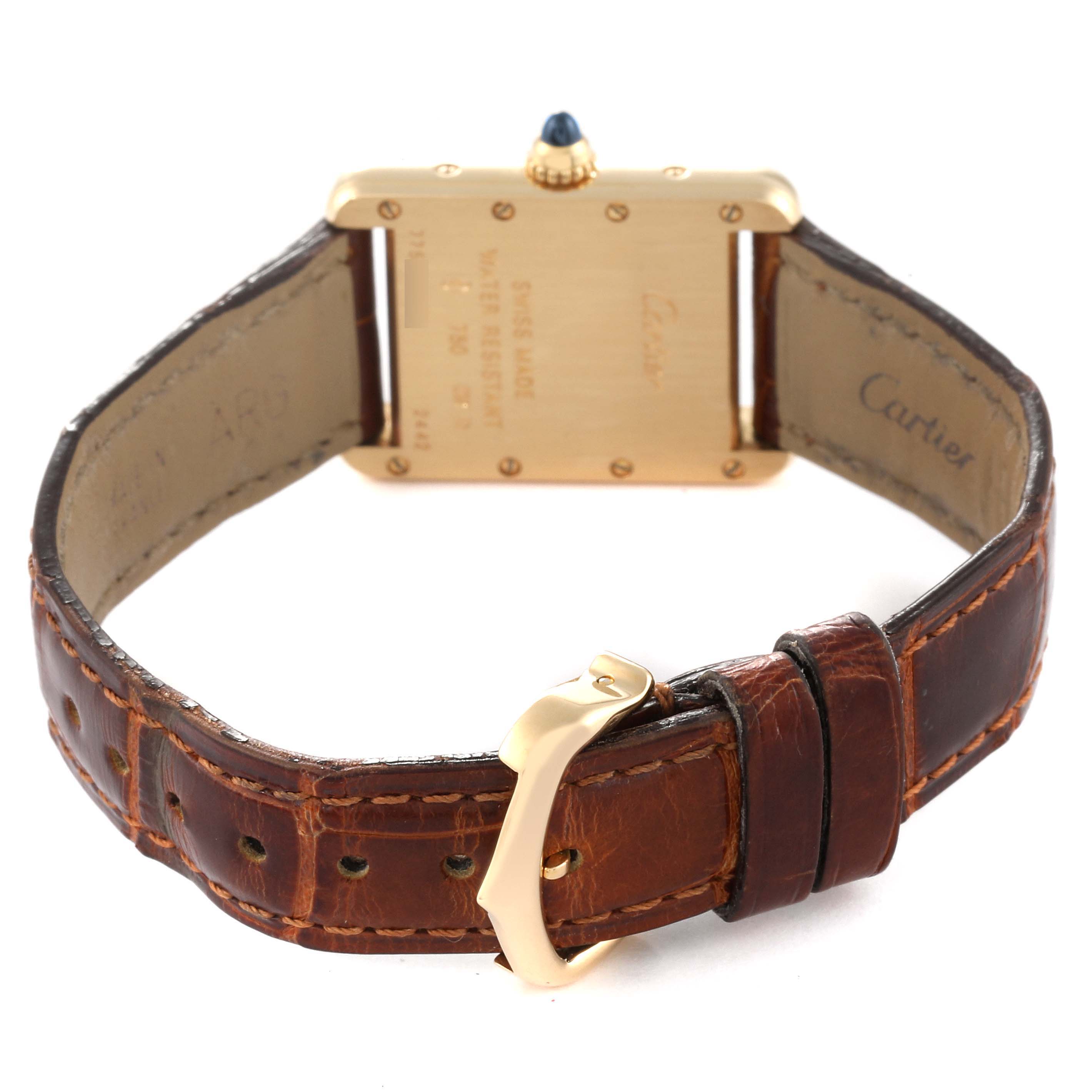 The image shows the back view of the Cartier Tank Louis W1529856 Women's Yellow Gold Silver Dial W1529856 Women's Yellow Gold Silver Dial watch, highlighting its leather strap and gold buckle.