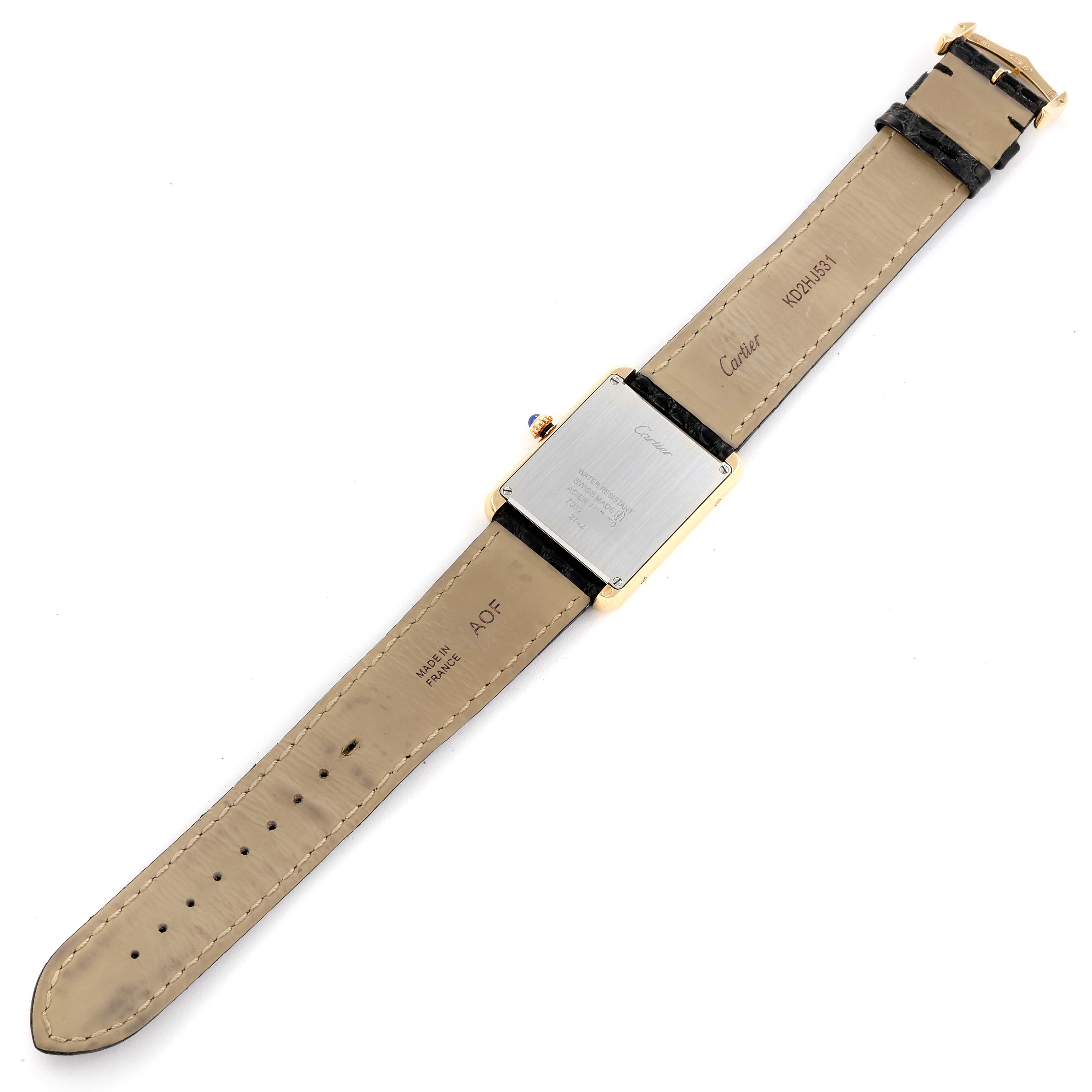 This image shows the back view of a Cartier Tank Solo W1018855 Men
s Yellow Gold Silver Dial W1018855 Men
s Yellow Gold Silver Dial watch, displaying its rectangular case and leather strap.