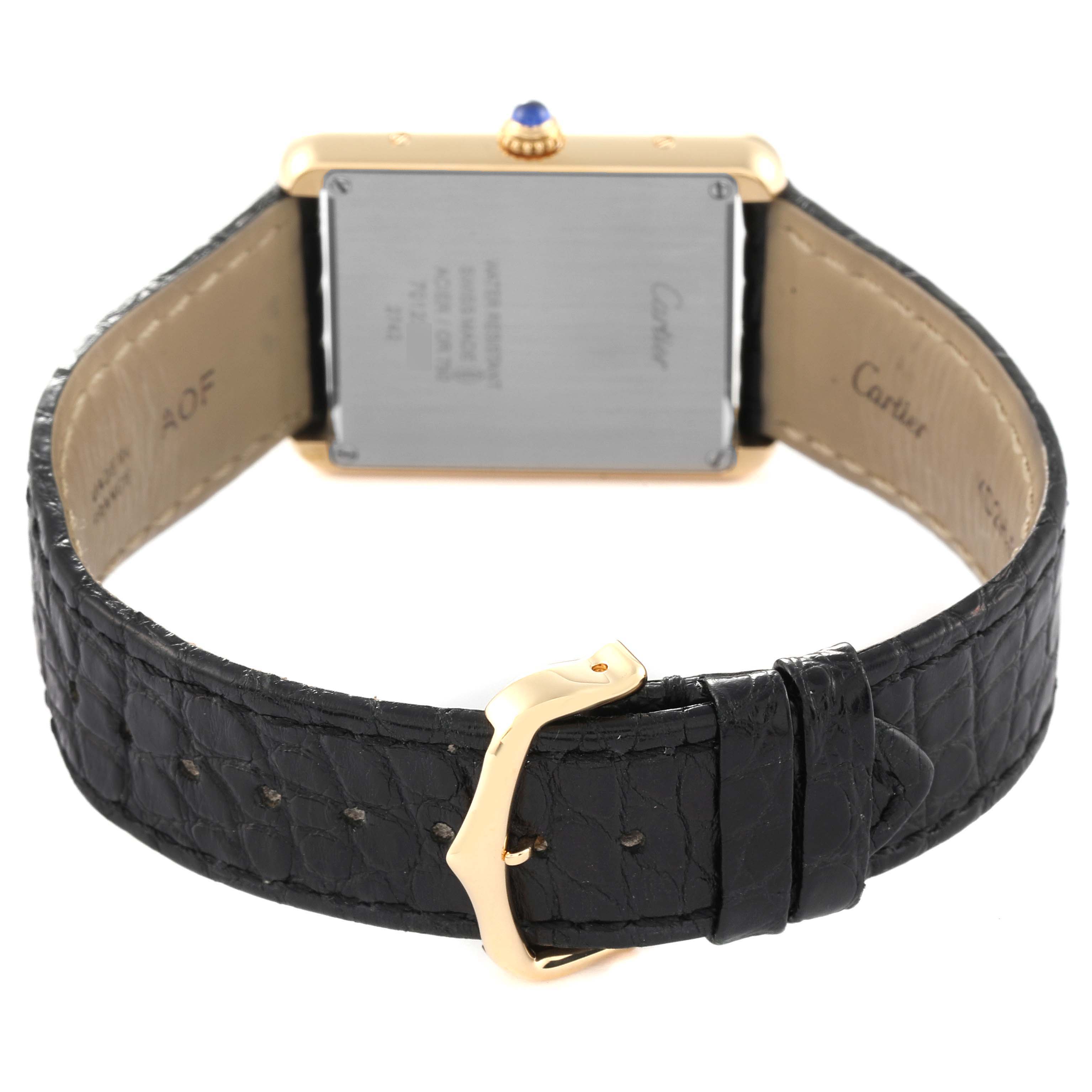 This image shows the back view of a Cartier Tank Solo W1018855 Men
s Yellow Gold Silver Dial W1018855 Men
s Yellow Gold Silver Dial watch, including the case back, crown, strap, and buckle.