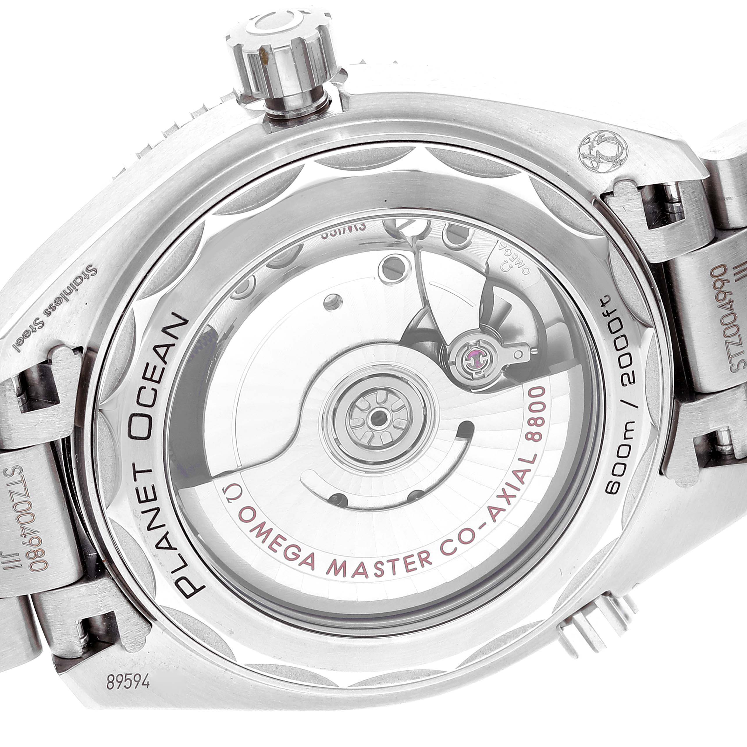 The image shows the back of the Omega Planet Ocean 215.30.40.20.03.001 Men
s Stainless Steel Black Dial 215.30.40.20.03.001 Men
s Stainless Steel Black Dial watch, highlighting its movement and "Omega Master Co-Axial 8800" text.