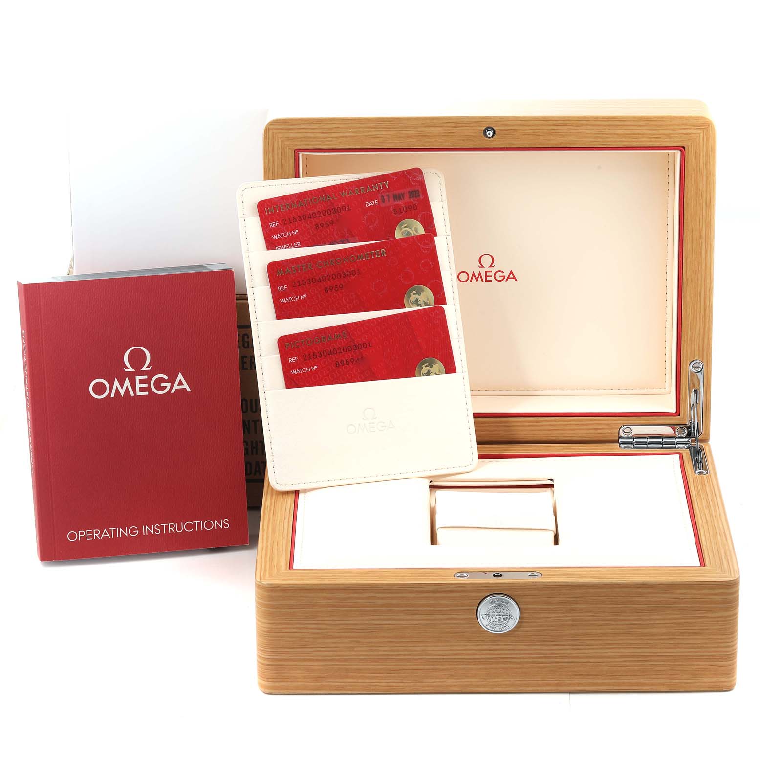 This image shows the Omega Planet Ocean 215.30.40.20.03.001 Men
s Stainless Steel Black Dial 215.30.40.20.03.001 Men
s Stainless Steel Black Dial watch box with operating instructions and warranty cards at a front angle.