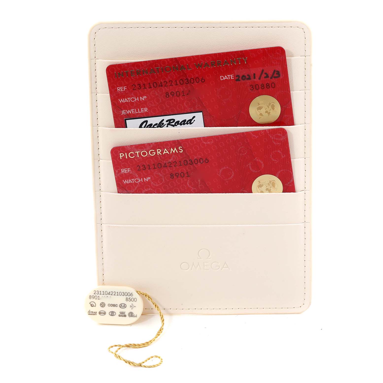 The image shows warranty cards and tags for an Omega Aqua Terra 231.10.42.21.03.006 Men's Stainless Steel Blue Dial 231.10.42.21.03.006 Men's Stainless Steel Blue Dial watch from a top-down angle.