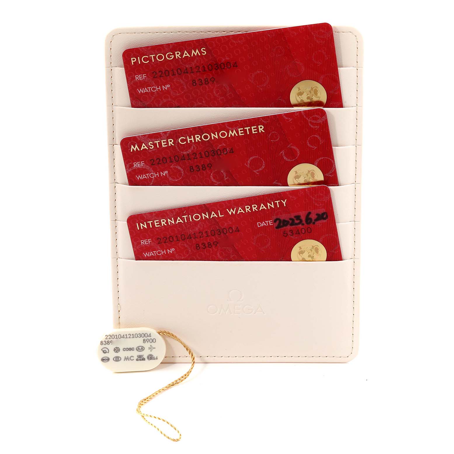 The image shows the warranty cards and tag for the Omega Aqua Terra 220.10.41.21.03.004 Men
s Stainless Steel Blue Dial 220.10.41.21.03.004 Men
s Stainless Steel Blue Dial watch model.