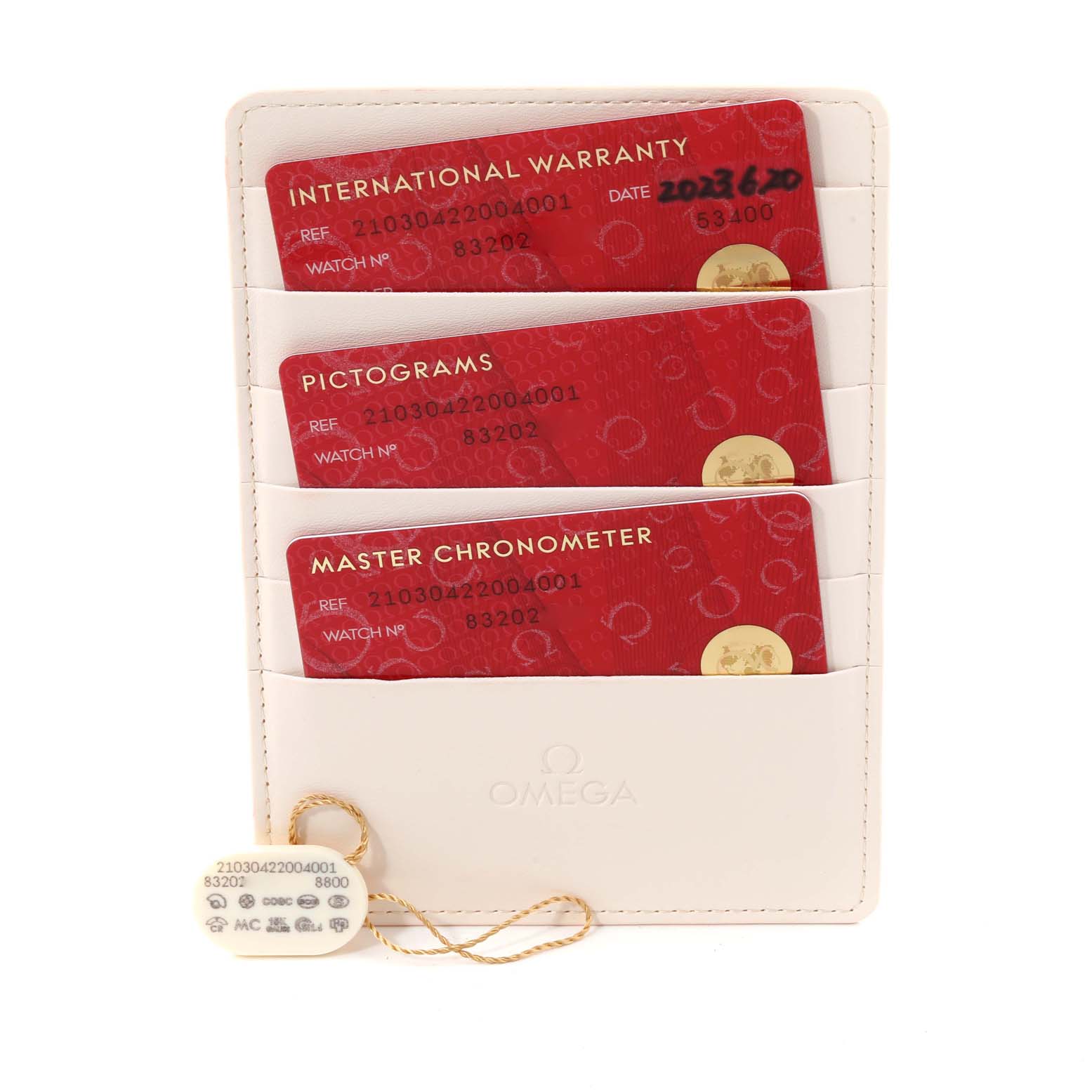 The image shows three red cards for the Omega Seamaster 210.30.42.20.04.001 Men's Stainless Steel White Dial 210.30.42.20.04.001 Men's Stainless Steel White Dial model, including International Warranty, Pictograms, and Master Chronometer cards, along with tags.