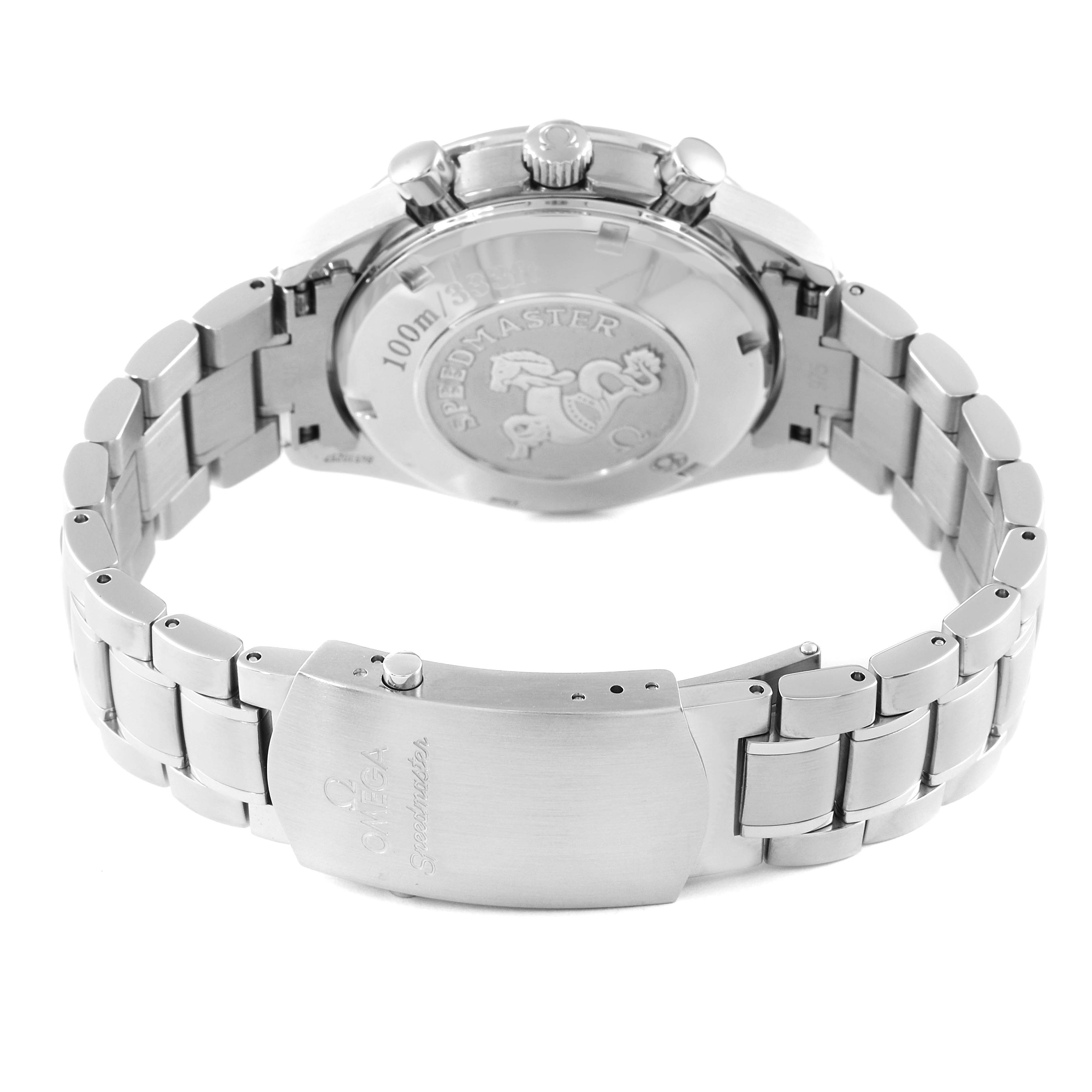 The image shows the Omega Speedmaster 3210.52.00 Men
s Stainless Steel Black Dial 3210.52.00 Men
s Stainless Steel Black Dial watch from a rear angle, highlighting the back case and part of the metal bracelet with clasp.