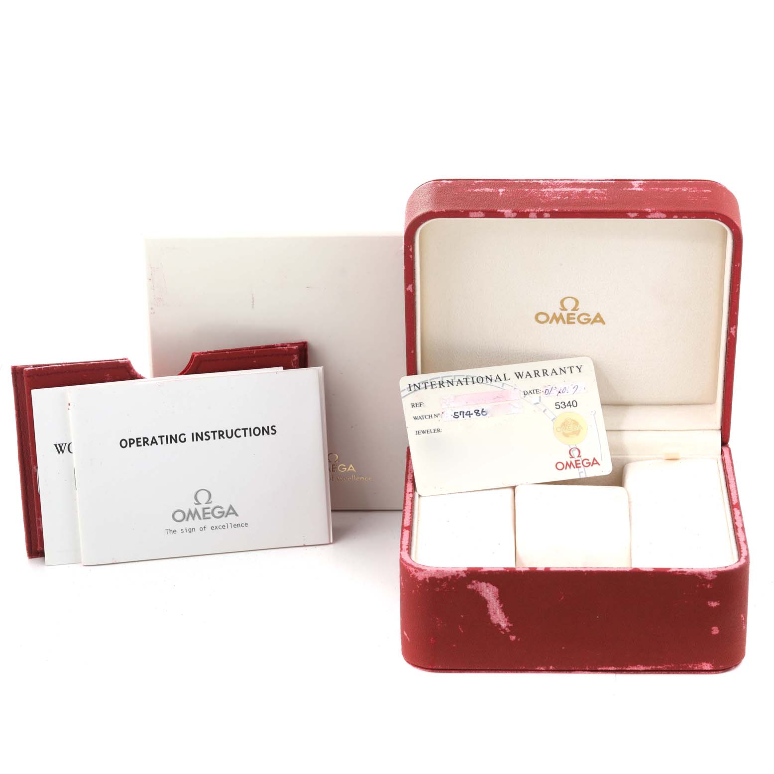 This image shows the box, operating instructions, warranty card, and booklet for the Omega Speedmaster 3523.80.00 Men
s Stainless Steel Blue Dial 3523.80.00 Men
s Stainless Steel Blue Dial model from a front angle.