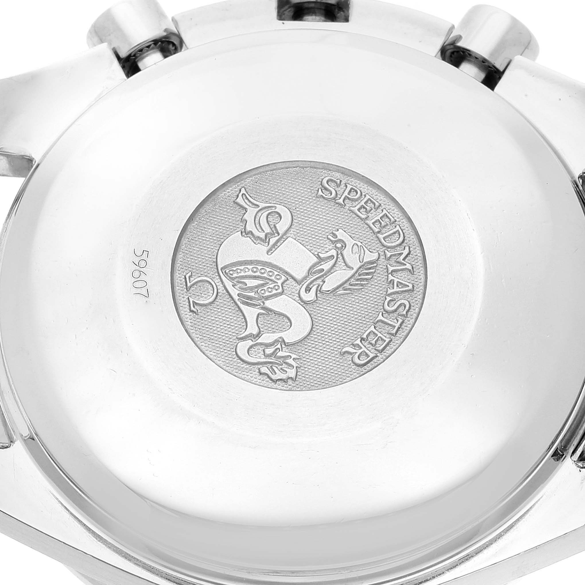 The image shows the back case of an Omega Speedmaster 3523.80.00 Men's Stainless Steel Blue Dial 3523.80.00 Men's Stainless Steel Blue Dial watch with its engraved emblem and the word "Speedmaster."