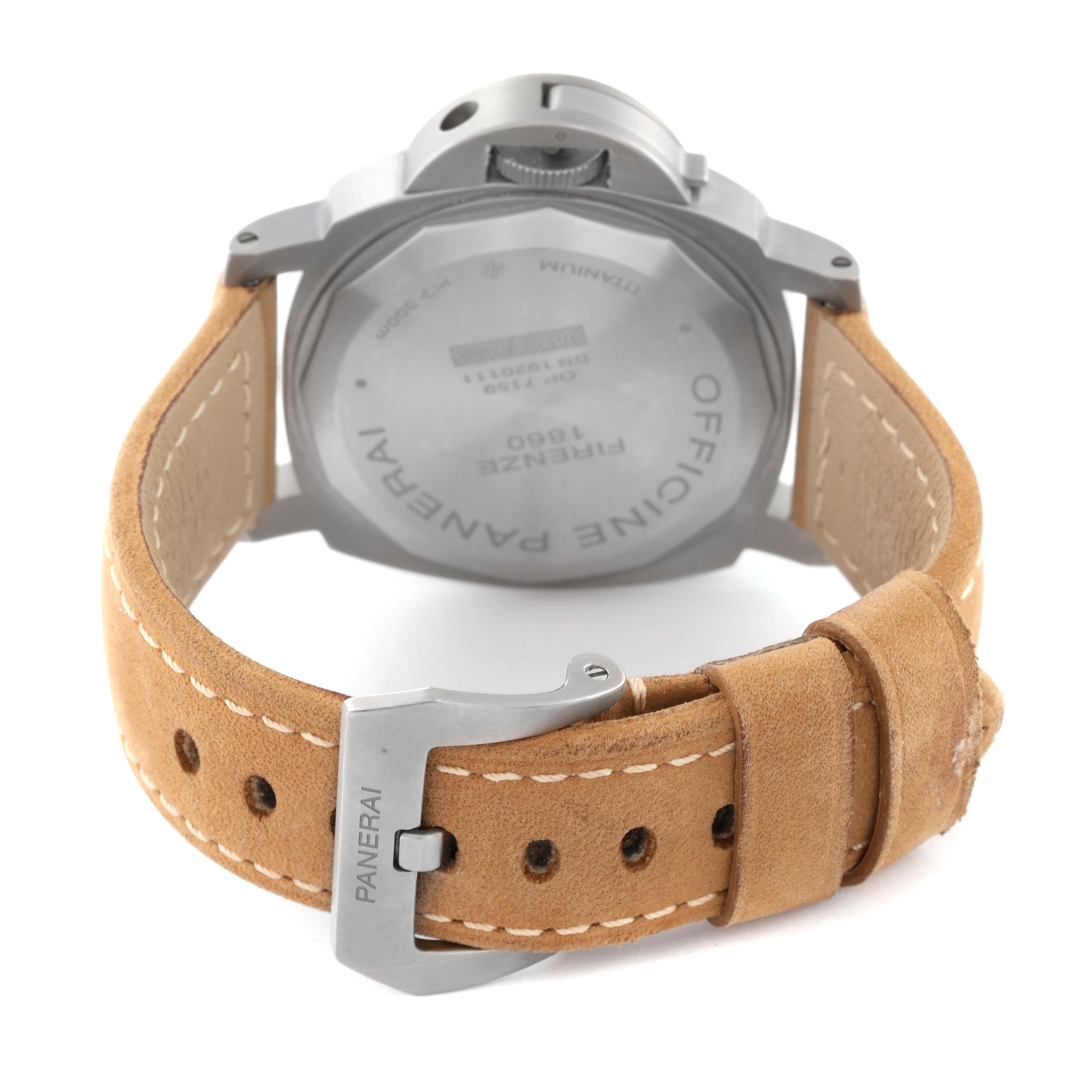 The image shows the back view of a Panerai Luminor PAM00797 Men's Titanium Brown Dial PAM00797 Men's Titanium Brown Dial watch, focusing on the case back and tan leather strap with buckle.