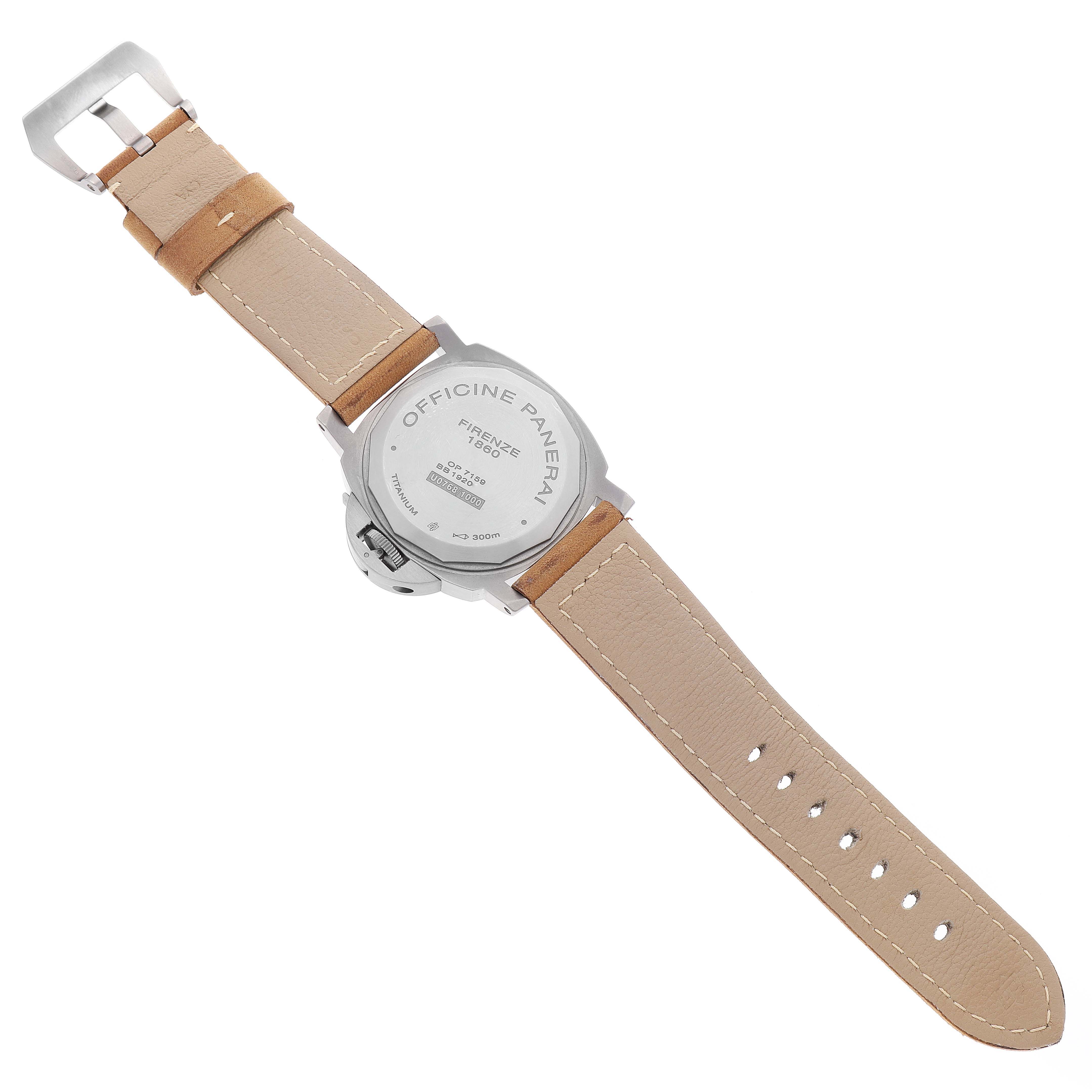 The image shows the back view of a Panerai Luminor PAM00797 Men's Titanium Brown Dial PAM00797 Men's Titanium Brown Dial watch with a light brown leather strap and a titanium case.
