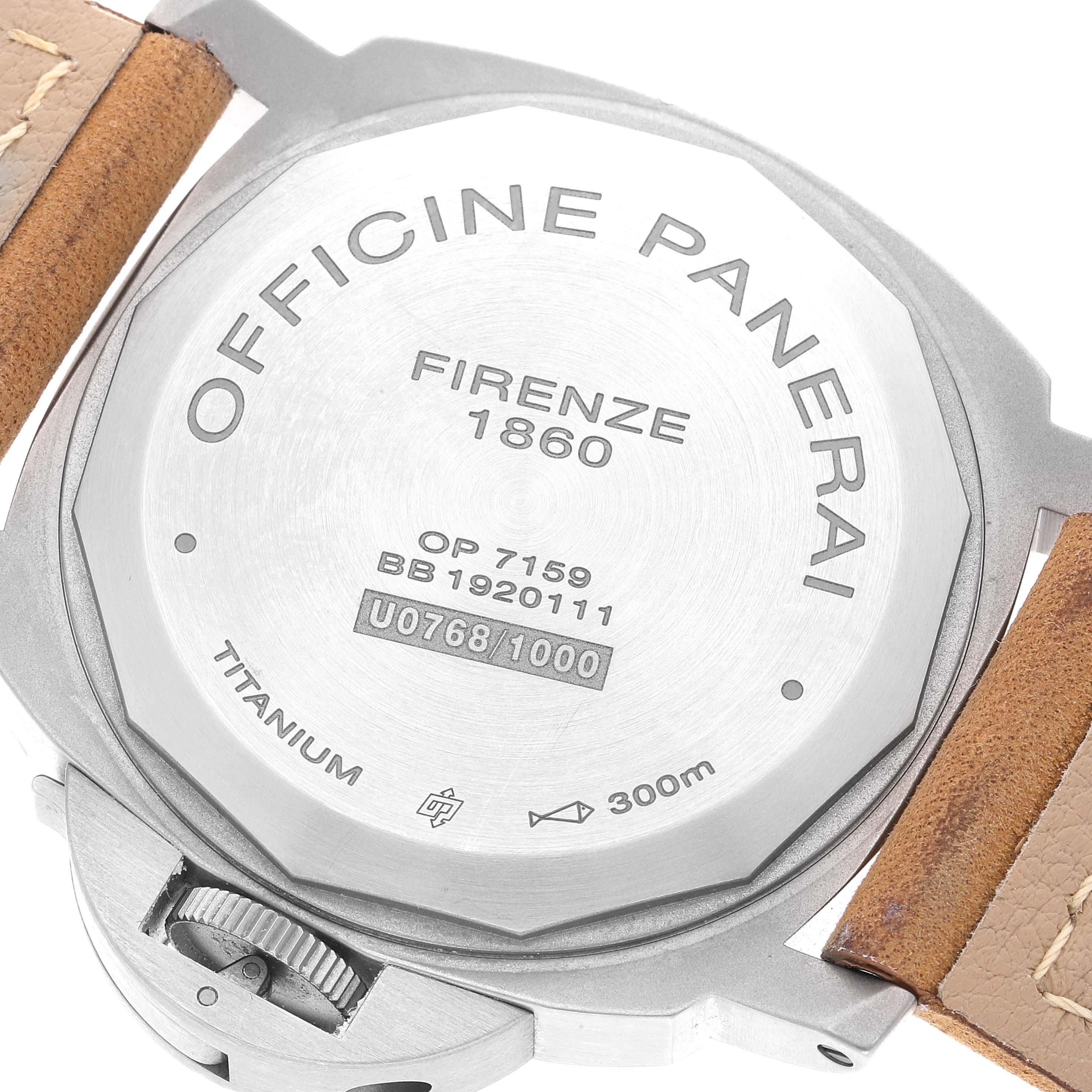 The image shows the back case and part of the strap of a Panerai Luminor PAM00797 Men's Titanium Brown Dial PAM00797 Men's Titanium Brown Dial watch, detailing its engravings and titanium build.