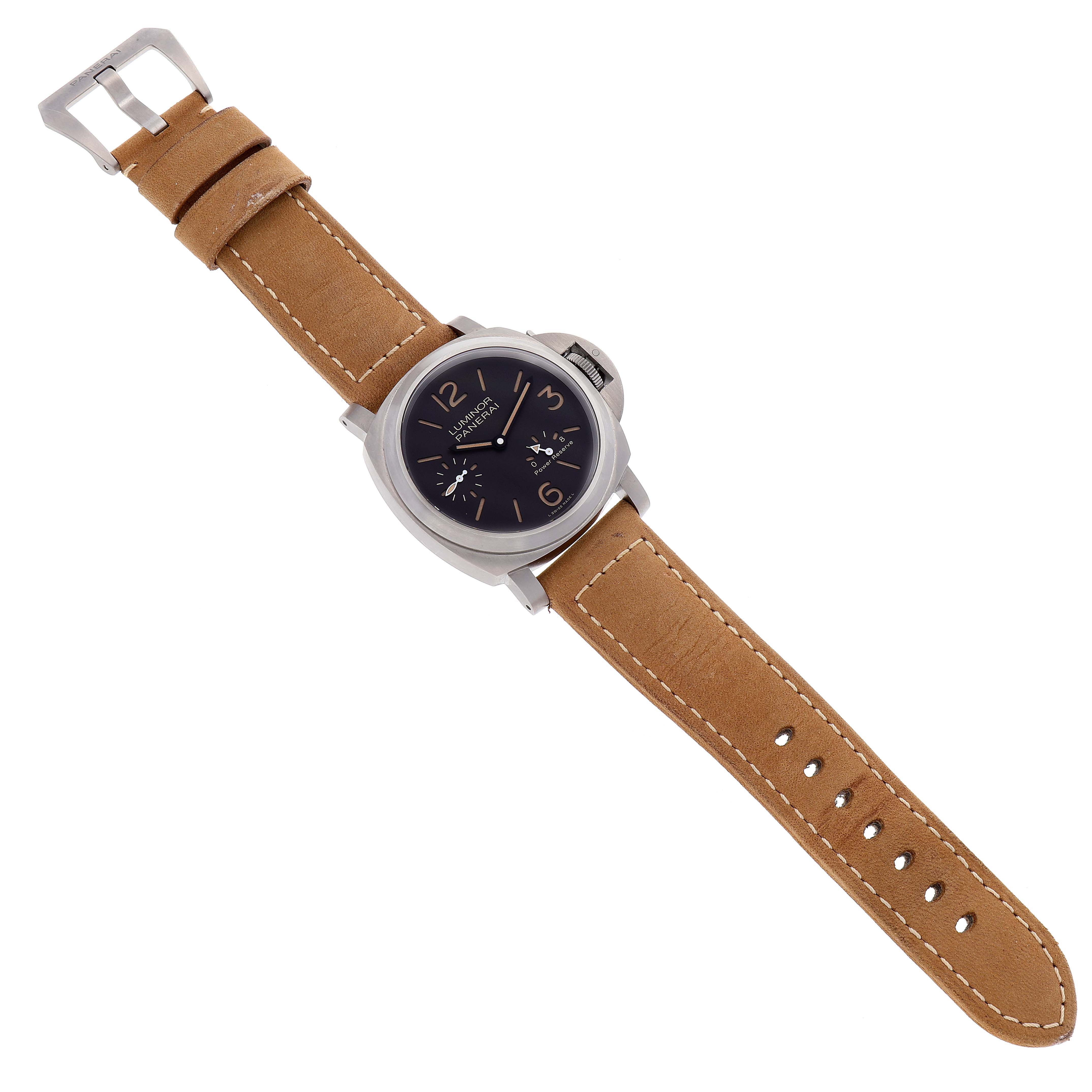 This image shows a top view of a Panerai Luminor PAM00797 Men's Titanium Brown Dial PAM00797 Men's Titanium Brown Dial watch featuring a brown leather strap and a black dial.
