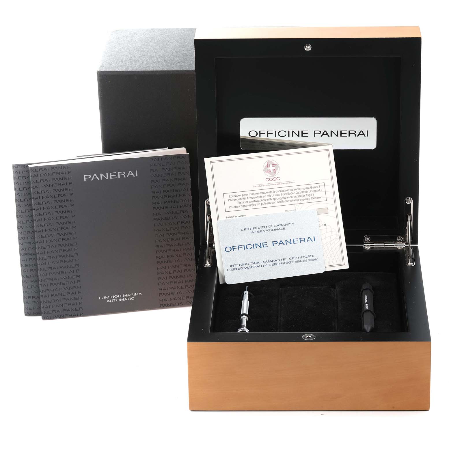 The image shows a top view of the Panerai Luminor PAM00048 Men
s Stainless Steel Black Dial PAM00048 Men
s Stainless Steel Black Dial watch box, manuals, certificates, and tools.