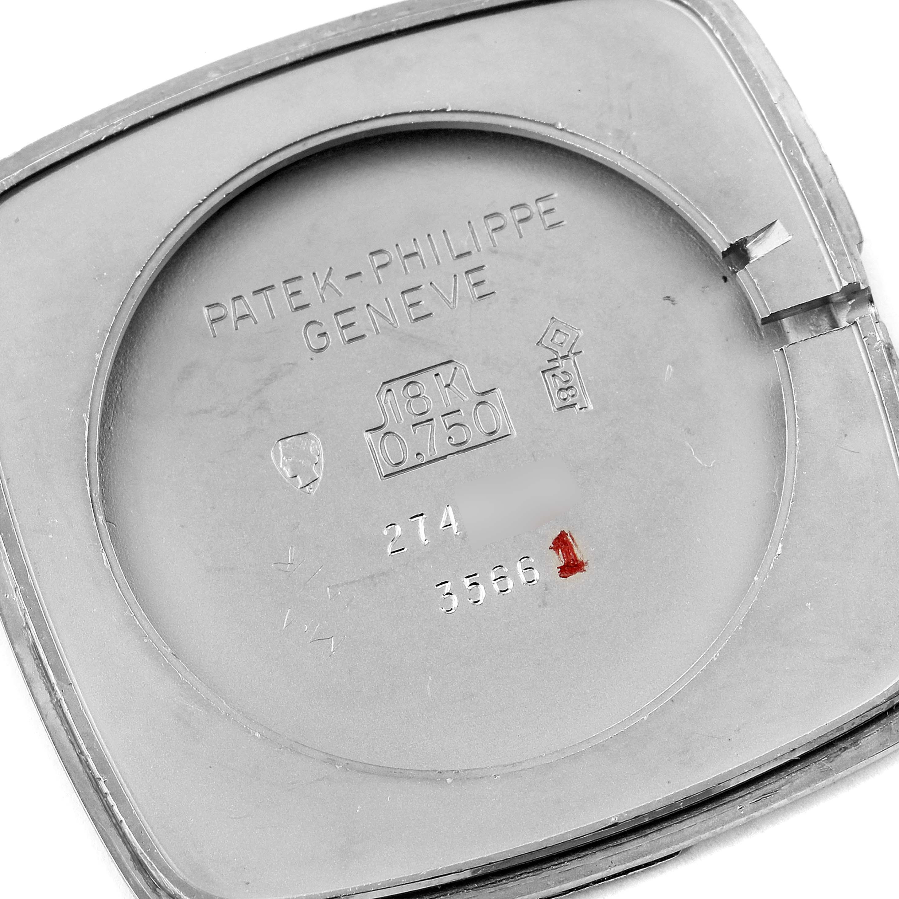 The image shows the interior of the case back of a Vintage Patek Philippe watch.